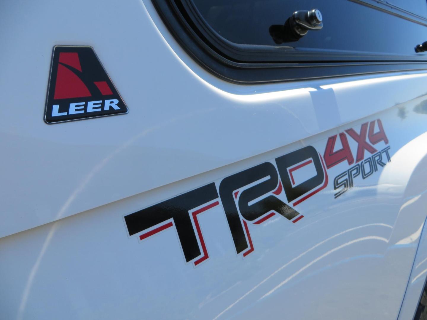 2021 White Toyota Tacoma SR5 Double Cab V6 6AT 4WD (3TMCZ5AN1MM) with an 3.5L V6 DOHC 24V engine, 6A transmission, located at 2630 Grass Valley Highway, Auburn, CA, 95603, (530) 508-5100, 38.937893, -121.095482 - Icon Vehicle Dynamics remote reservoir coilovers and shocks, Icon Upper control arms, 1552 wheels, Toyo AT3 tires, Rock Sliders, Victory 4x4 roof and camper shell rack, Leer Camper shell, Banks Idash. - Photo#30