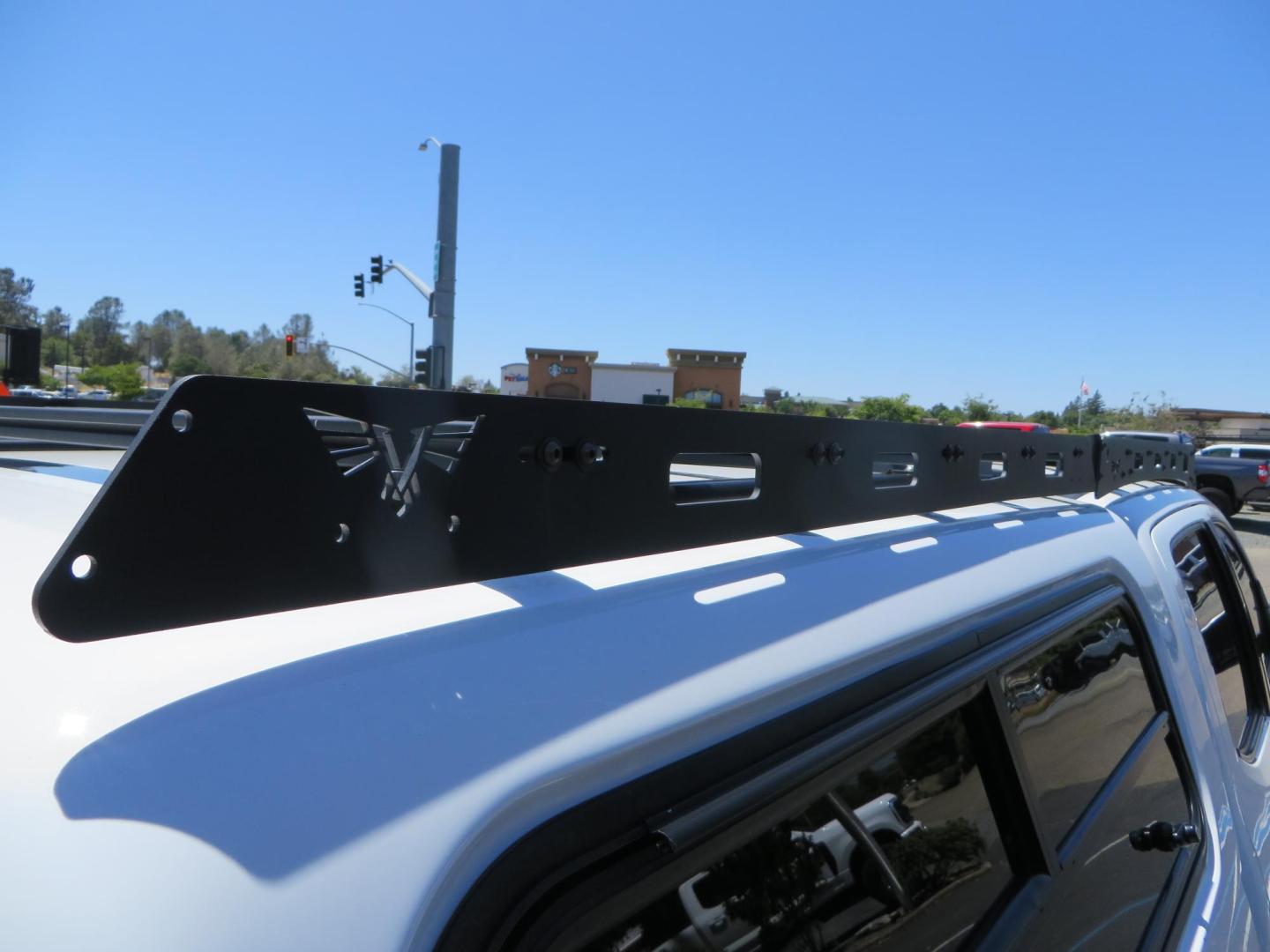 2021 White Toyota Tacoma SR5 Double Cab V6 6AT 4WD (3TMCZ5AN1MM) with an 3.5L V6 DOHC 24V engine, 6A transmission, located at 2630 Grass Valley Highway, Auburn, CA, 95603, (530) 508-5100, 38.937893, -121.095482 - Icon Vehicle Dynamics remote reservoir coilovers and shocks, Icon Upper control arms, 1552 wheels, Toyo AT3 tires, Rock Sliders, Victory 4x4 roof and camper shell rack, Leer Camper shell, Banks Idash. - Photo#32