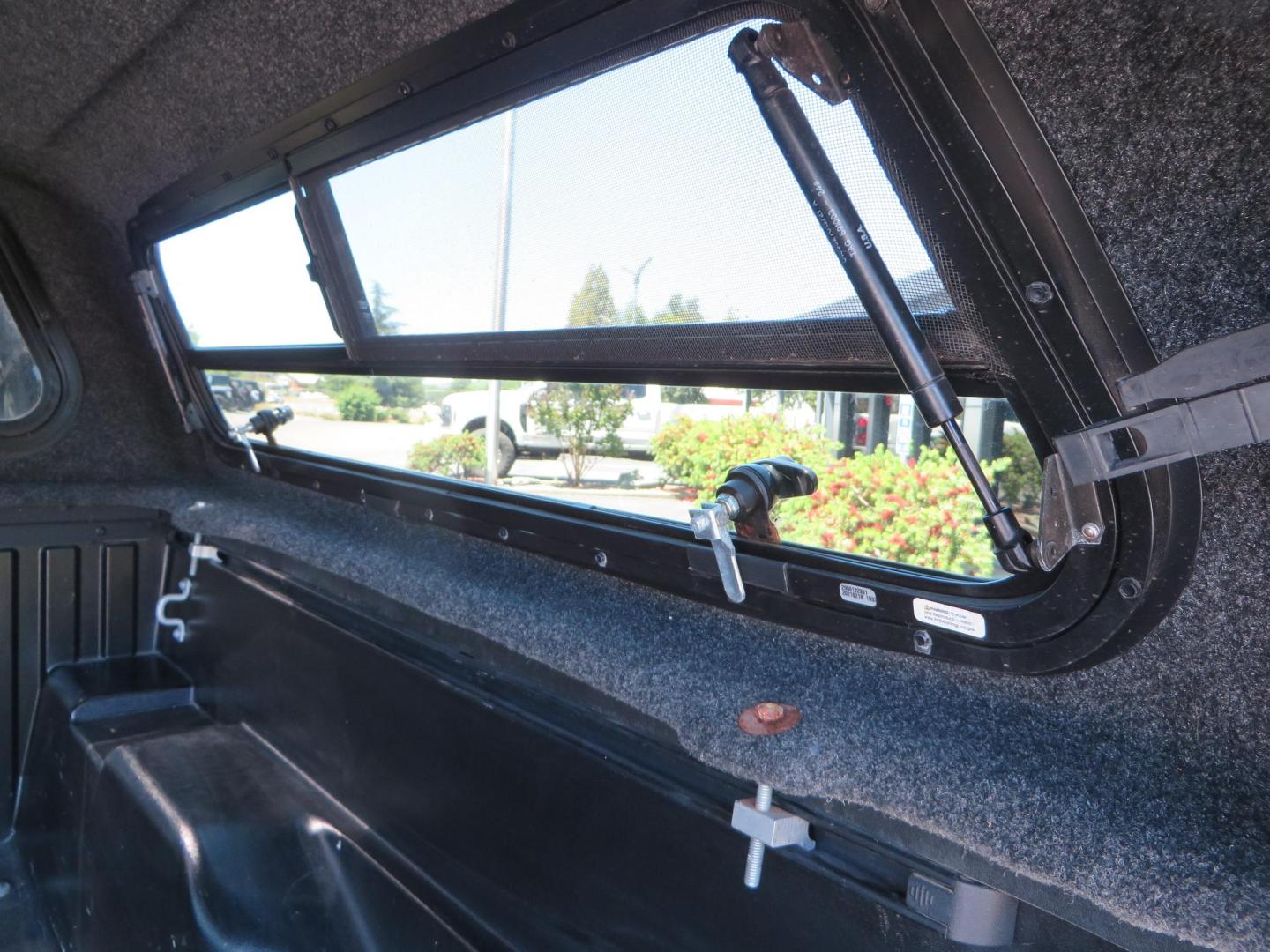 2021 White Toyota Tacoma SR5 Double Cab V6 6AT 4WD (3TMCZ5AN1MM) with an 3.5L V6 DOHC 24V engine, 6A transmission, located at 2630 Grass Valley Highway, Auburn, CA, 95603, (530) 508-5100, 38.937893, -121.095482 - Icon Vehicle Dynamics remote reservoir coilovers and shocks, Icon Upper control arms, 1552 wheels, Toyo AT3 tires, Rock Sliders, Victory 4x4 roof and camper shell rack, Leer Camper shell, Banks Idash. - Photo#37