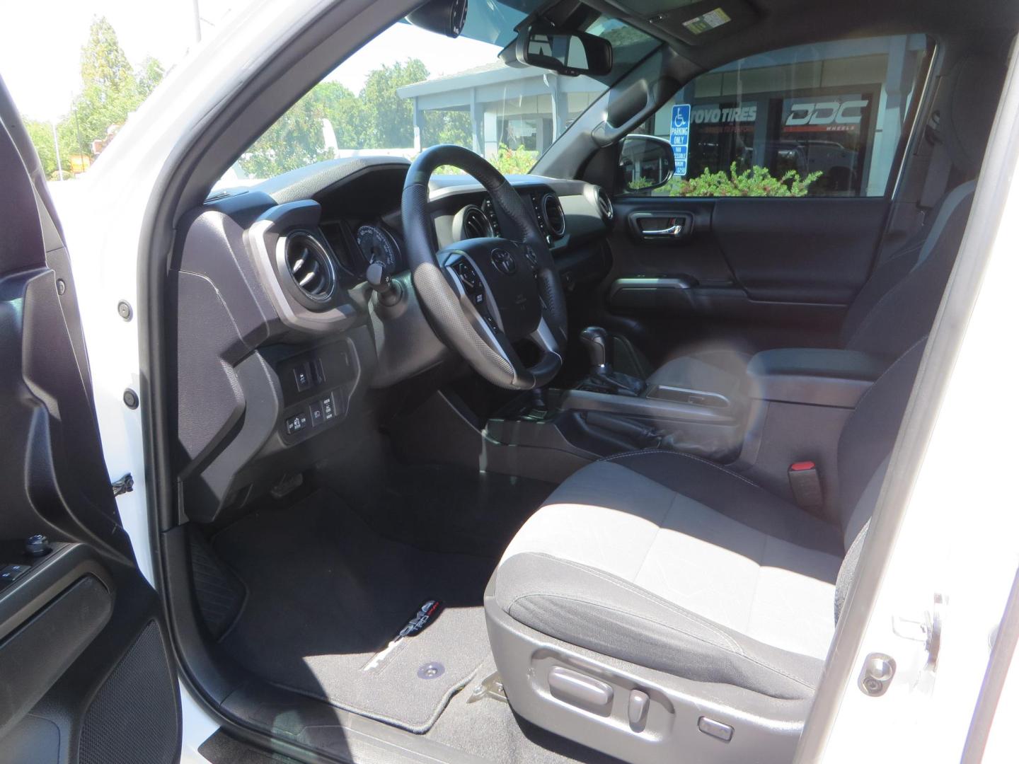 2021 White Toyota Tacoma SR5 Double Cab V6 6AT 4WD (3TMCZ5AN1MM) with an 3.5L V6 DOHC 24V engine, 6A transmission, located at 2630 Grass Valley Highway, Auburn, CA, 95603, (530) 508-5100, 38.937893, -121.095482 - Icon Vehicle Dynamics remote reservoir coilovers and shocks, Icon Upper control arms, 1552 wheels, Toyo AT3 tires, Rock Sliders, Victory 4x4 roof and camper shell rack, Leer Camper shell, Banks Idash. - Photo#38