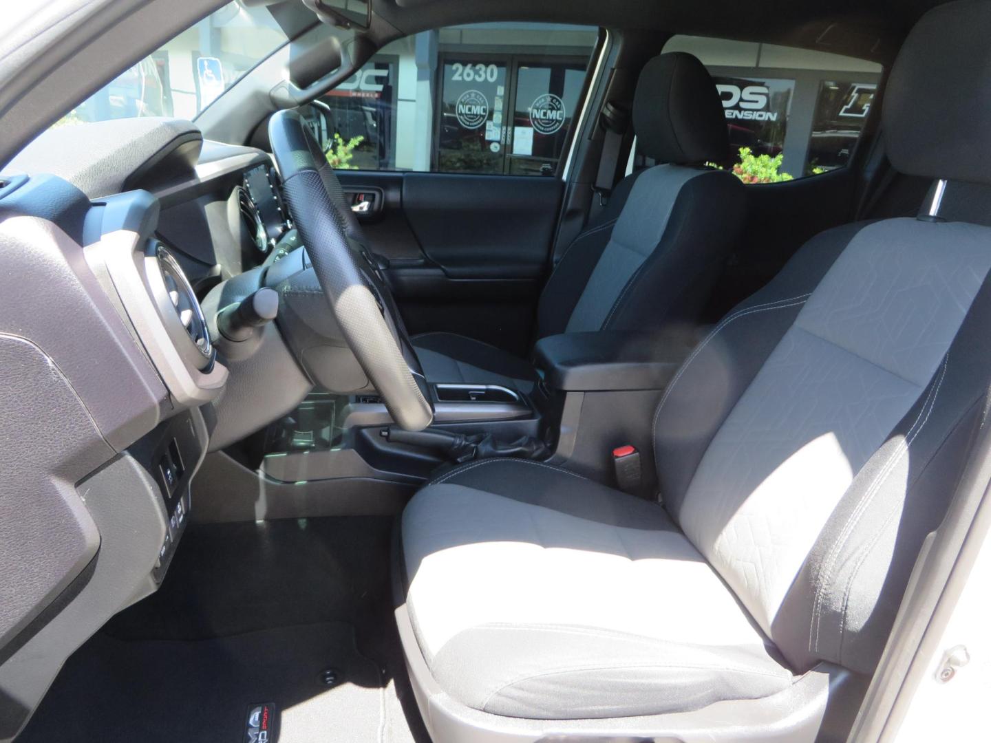 2021 White Toyota Tacoma SR5 Double Cab V6 6AT 4WD (3TMCZ5AN1MM) with an 3.5L V6 DOHC 24V engine, 6A transmission, located at 2630 Grass Valley Highway, Auburn, CA, 95603, (530) 508-5100, 38.937893, -121.095482 - Icon Vehicle Dynamics remote reservoir coilovers and shocks, Icon Upper control arms, 1552 wheels, Toyo AT3 tires, Rock Sliders, Victory 4x4 roof and camper shell rack, Leer Camper shell, Banks Idash. - Photo#39