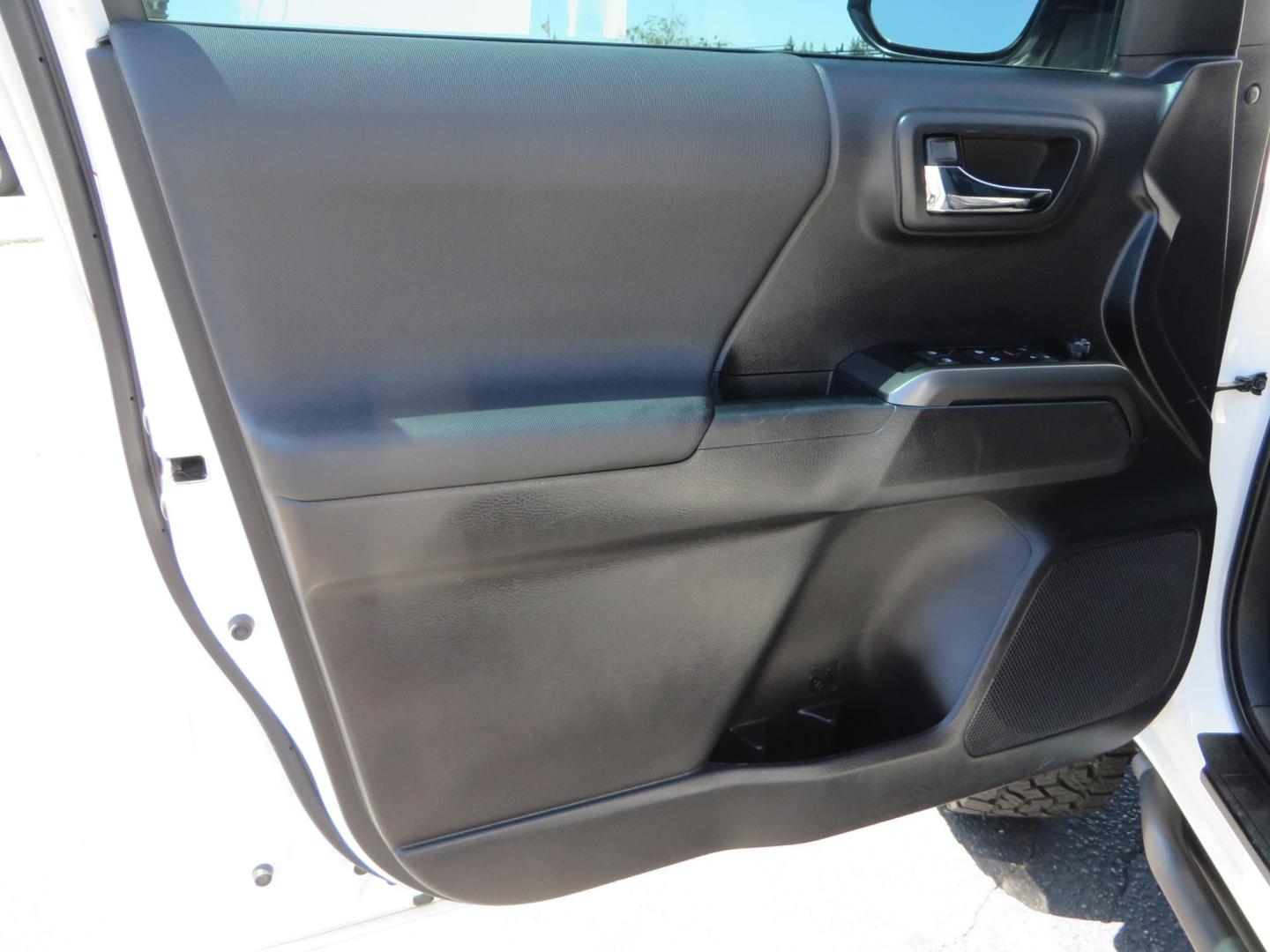 2021 White Toyota Tacoma SR5 Double Cab V6 6AT 4WD (3TMCZ5AN1MM) with an 3.5L V6 DOHC 24V engine, 6A transmission, located at 2630 Grass Valley Highway, Auburn, CA, 95603, (530) 508-5100, 38.937893, -121.095482 - Icon Vehicle Dynamics remote reservoir coilovers and shocks, Icon Upper control arms, 1552 wheels, Toyo AT3 tires, Rock Sliders, Victory 4x4 roof and camper shell rack, Leer Camper shell, Banks Idash. - Photo#40