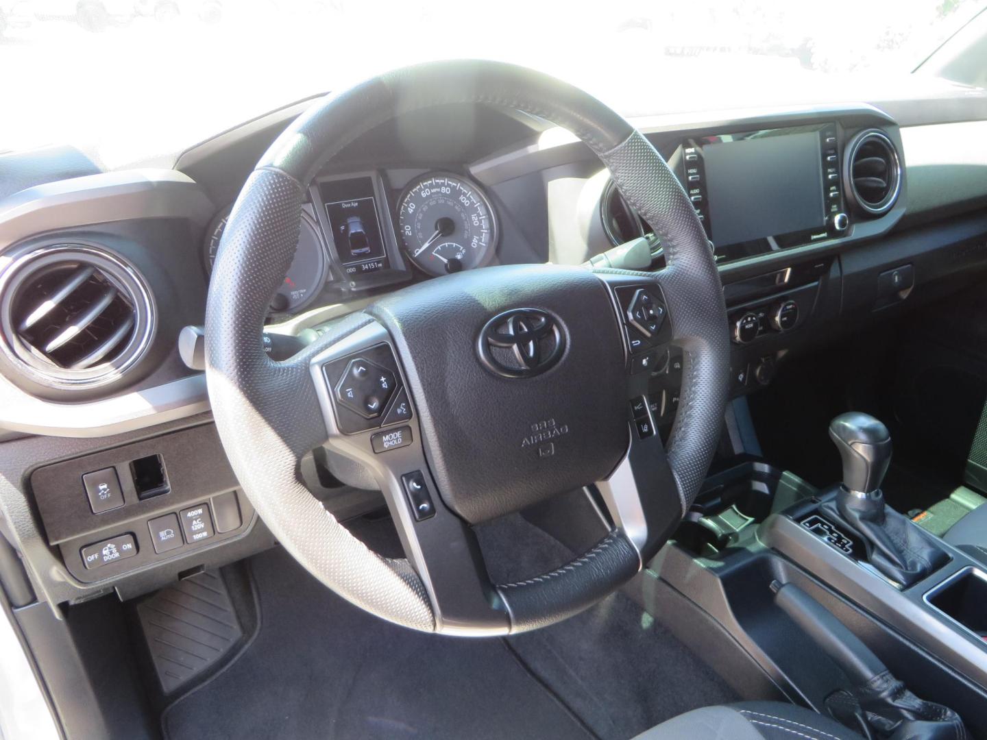 2021 White Toyota Tacoma SR5 Double Cab V6 6AT 4WD (3TMCZ5AN1MM) with an 3.5L V6 DOHC 24V engine, 6A transmission, located at 2630 Grass Valley Highway, Auburn, CA, 95603, (530) 508-5100, 38.937893, -121.095482 - Icon Vehicle Dynamics remote reservoir coilovers and shocks, Icon Upper control arms, 1552 wheels, Toyo AT3 tires, Rock Sliders, Victory 4x4 roof and camper shell rack, Leer Camper shell, Banks Idash. - Photo#41