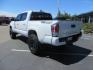 2021 White Toyota Tacoma SR5 Double Cab V6 6AT 4WD (3TYCZ5AN8MT) with an 3.5L V6 DOHC 24V engine, 6A transmission, located at 2630 Grass Valley Highway, Auburn, CA, 95603, (530) 508-5100, 38.937893, -121.095482 - Leveled Tacoma sitting on 18" Fuel wheels, Toyo RT tires, and window tint. - Photo#6