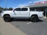 2021 White Toyota Tacoma SR5 Double Cab V6 6AT 4WD (3TYCZ5AN8MT) with an 3.5L V6 DOHC 24V engine, 6A transmission, located at 2630 Grass Valley Highway, Auburn, CA, 95603, (530) 508-5100, 38.937893, -121.095482 - Leveled Tacoma sitting on 18" Fuel wheels, Toyo RT tires, and window tint. - Photo#7