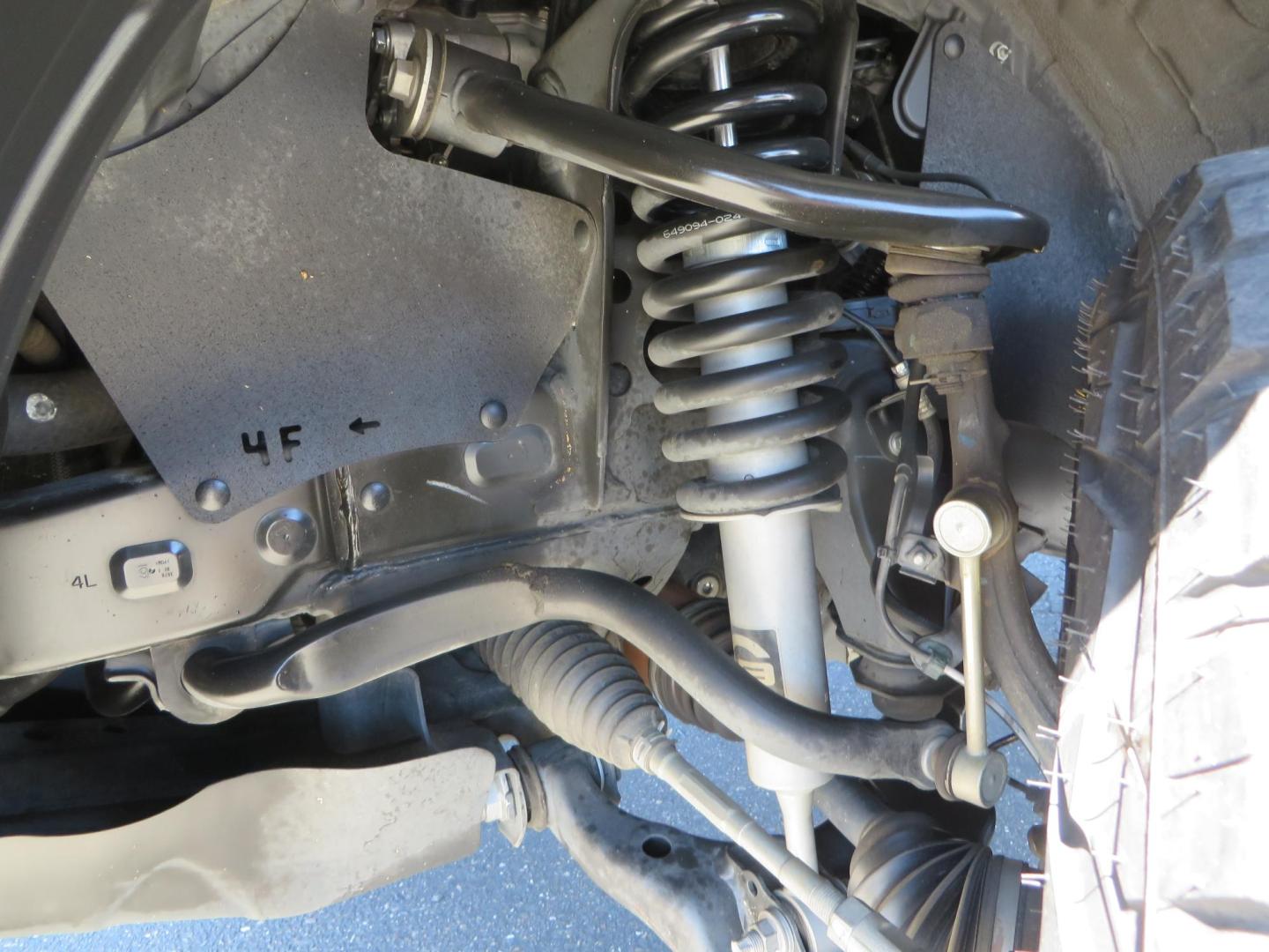 2021 White Toyota Tacoma SR5 Double Cab V6 6AT 4WD (3TYCZ5AN8MT) with an 3.5L V6 DOHC 24V engine, 6A transmission, located at 2630 Grass Valley Highway, Auburn, CA, 95603, (530) 508-5100, 38.937893, -121.095482 - Leveled Tacoma sitting on 18" Fuel wheels, Toyo RT tires, and window tint. - Photo#10