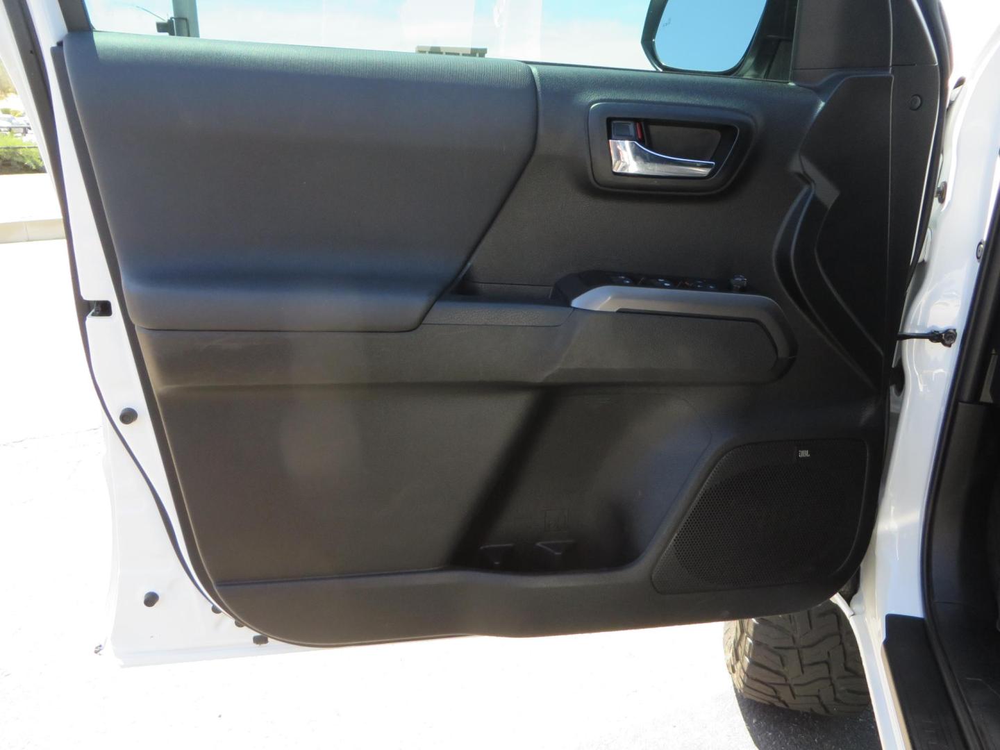 2021 White Toyota Tacoma SR5 Double Cab V6 6AT 4WD (3TYCZ5AN8MT) with an 3.5L V6 DOHC 24V engine, 6A transmission, located at 2630 Grass Valley Highway, Auburn, CA, 95603, (530) 508-5100, 38.937893, -121.095482 - Leveled Tacoma sitting on 18" Fuel wheels, Toyo RT tires, and window tint. - Photo#13