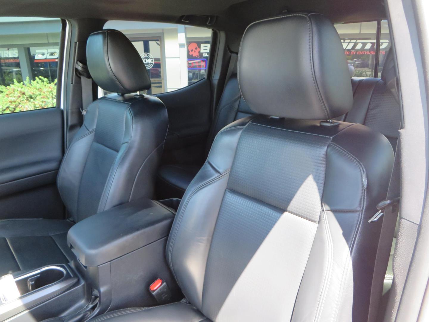 2021 White Toyota Tacoma SR5 Double Cab V6 6AT 4WD (3TYCZ5AN8MT) with an 3.5L V6 DOHC 24V engine, 6A transmission, located at 2630 Grass Valley Highway, Auburn, CA, 95603, (530) 508-5100, 38.937893, -121.095482 - Leveled Tacoma sitting on 18" Fuel wheels, Toyo RT tires, and window tint. - Photo#17