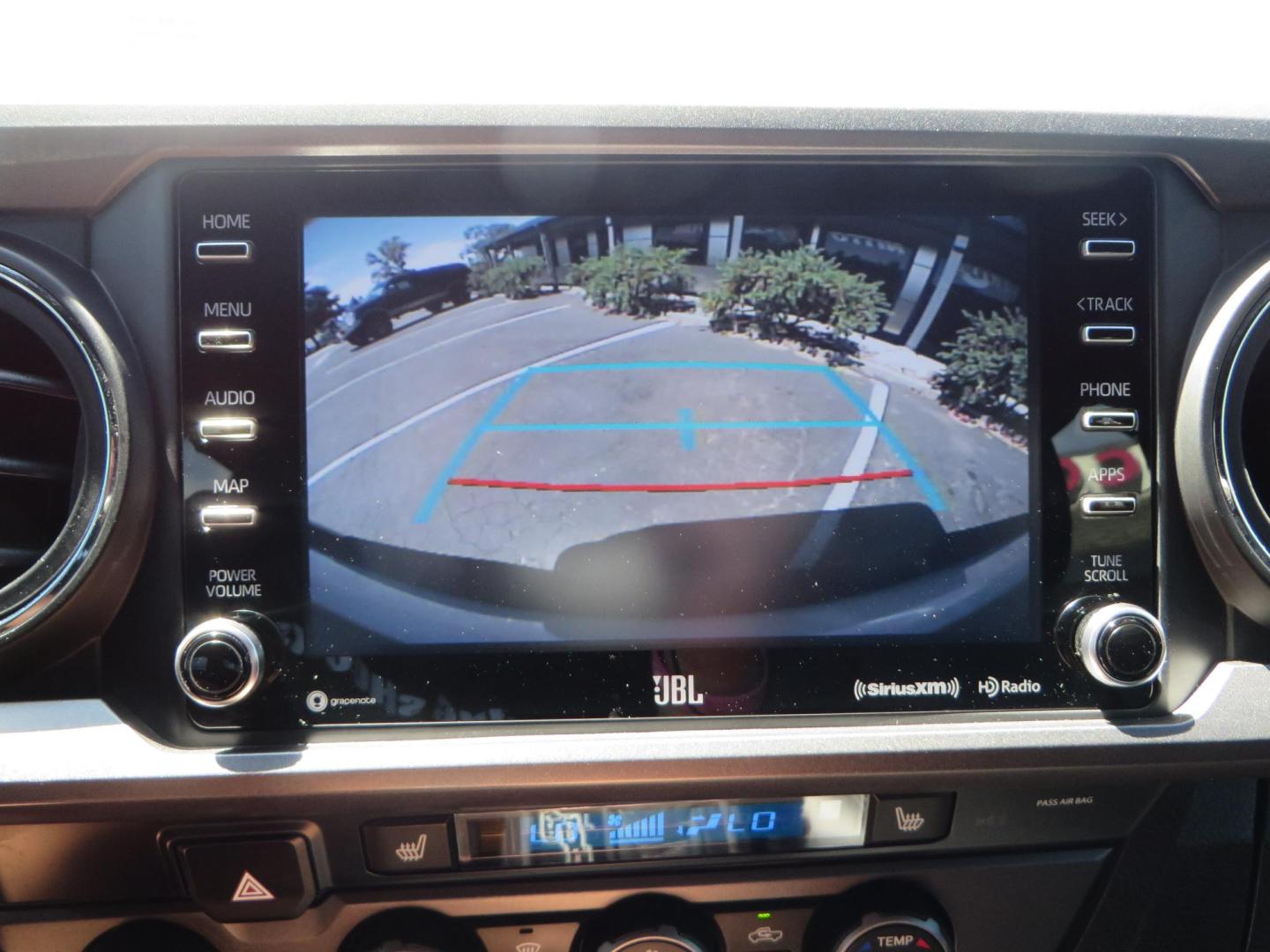 2021 White Toyota Tacoma SR5 Double Cab V6 6AT 4WD (3TYCZ5AN8MT) with an 3.5L V6 DOHC 24V engine, 6A transmission, located at 2630 Grass Valley Highway, Auburn, CA, 95603, (530) 508-5100, 38.937893, -121.095482 - Leveled Tacoma sitting on 18" Fuel wheels, Toyo RT tires, and window tint. - Photo#24