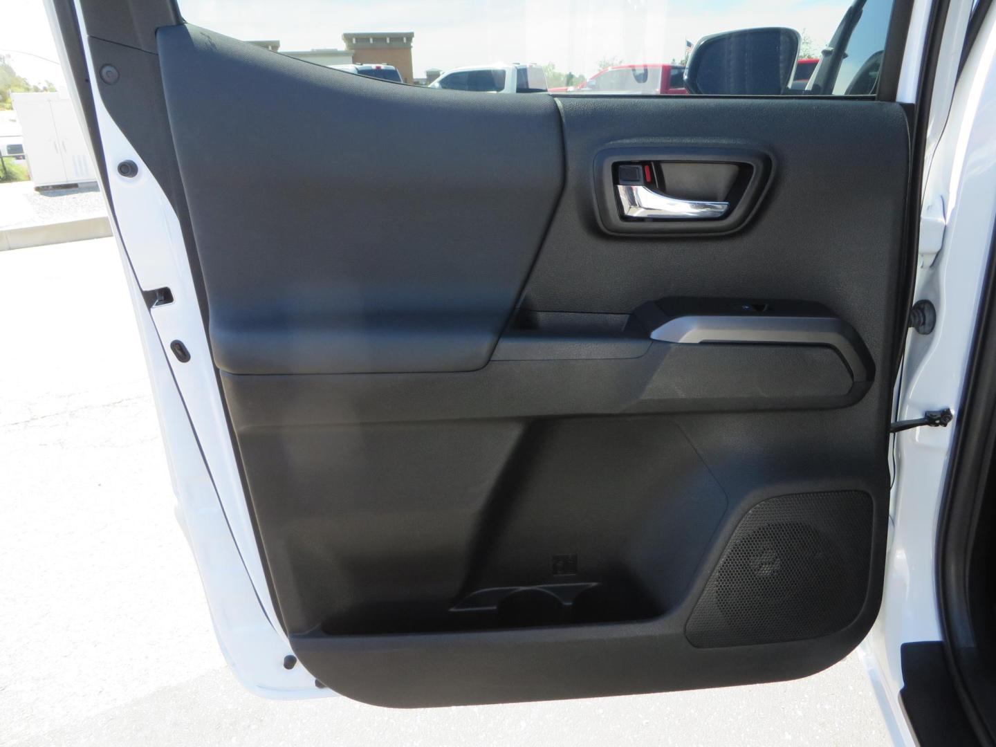 2021 White Toyota Tacoma SR5 Double Cab V6 6AT 4WD (3TYCZ5AN8MT) with an 3.5L V6 DOHC 24V engine, 6A transmission, located at 2630 Grass Valley Highway, Auburn, CA, 95603, (530) 508-5100, 38.937893, -121.095482 - Leveled Tacoma sitting on 18" Fuel wheels, Toyo RT tires, and window tint. - Photo#34