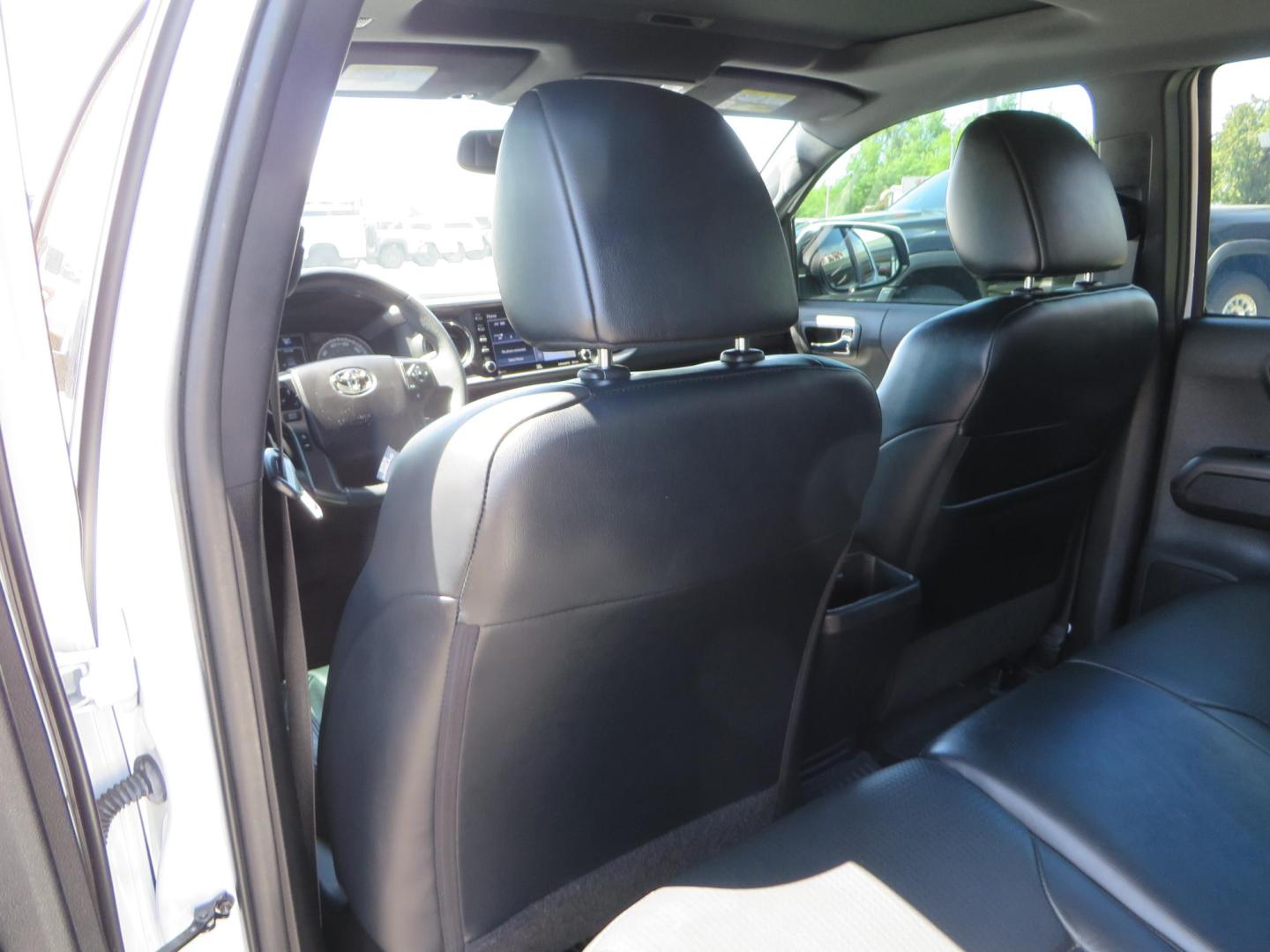 2021 White Toyota Tacoma SR5 Double Cab V6 6AT 4WD (3TYCZ5AN8MT) with an 3.5L V6 DOHC 24V engine, 6A transmission, located at 2630 Grass Valley Highway, Auburn, CA, 95603, (530) 508-5100, 38.937893, -121.095482 - Leveled Tacoma sitting on 18" Fuel wheels, Toyo RT tires, and window tint. - Photo#38