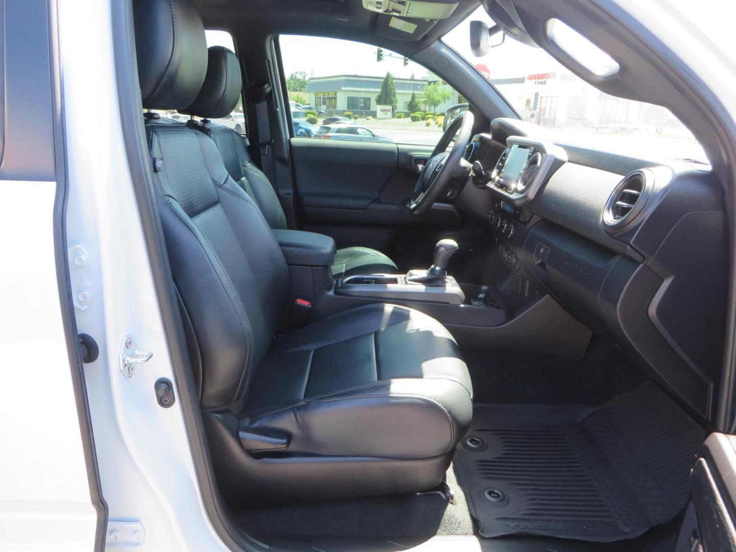 2021 White Toyota Tacoma SR5 Double Cab V6 6AT 4WD (3TYCZ5AN8MT) with an 3.5L V6 DOHC 24V engine, 6A transmission, located at 2630 Grass Valley Highway, Auburn, CA, 95603, (530) 508-5100, 38.937893, -121.095482 - Leveled Tacoma sitting on 18" Fuel wheels, Toyo RT tires, and window tint. - Photo#43