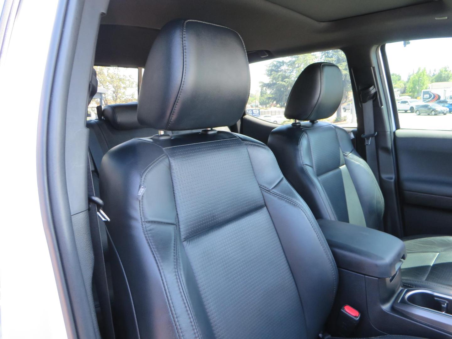 2021 White Toyota Tacoma SR5 Double Cab V6 6AT 4WD (3TYCZ5AN8MT) with an 3.5L V6 DOHC 24V engine, 6A transmission, located at 2630 Grass Valley Highway, Auburn, CA, 95603, (530) 508-5100, 38.937893, -121.095482 - Leveled Tacoma sitting on 18" Fuel wheels, Toyo RT tires, and window tint. - Photo#44