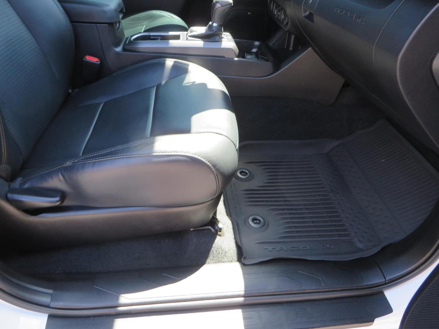 2021 White Toyota Tacoma SR5 Double Cab V6 6AT 4WD (3TYCZ5AN8MT) with an 3.5L V6 DOHC 24V engine, 6A transmission, located at 2630 Grass Valley Highway, Auburn, CA, 95603, (530) 508-5100, 38.937893, -121.095482 - Leveled Tacoma sitting on 18" Fuel wheels, Toyo RT tires, and window tint. - Photo#45