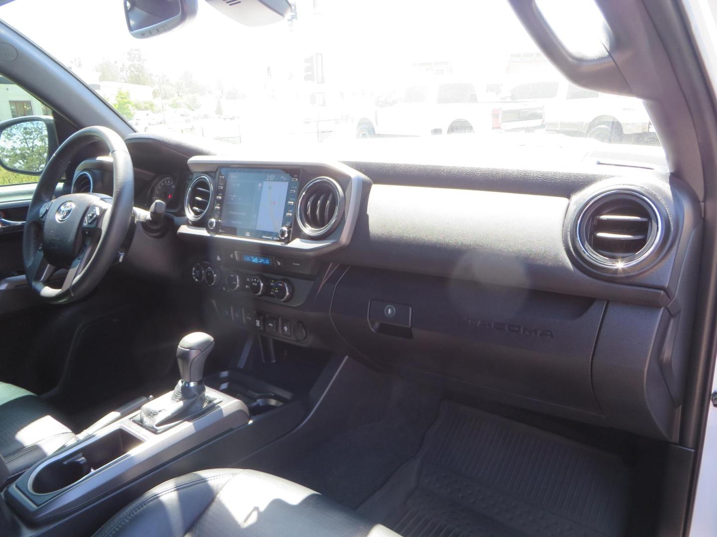 2021 White Toyota Tacoma SR5 Double Cab V6 6AT 4WD (3TYCZ5AN8MT) with an 3.5L V6 DOHC 24V engine, 6A transmission, located at 2630 Grass Valley Highway, Auburn, CA, 95603, (530) 508-5100, 38.937893, -121.095482 - Leveled Tacoma sitting on 18" Fuel wheels, Toyo RT tires, and window tint. - Photo#46