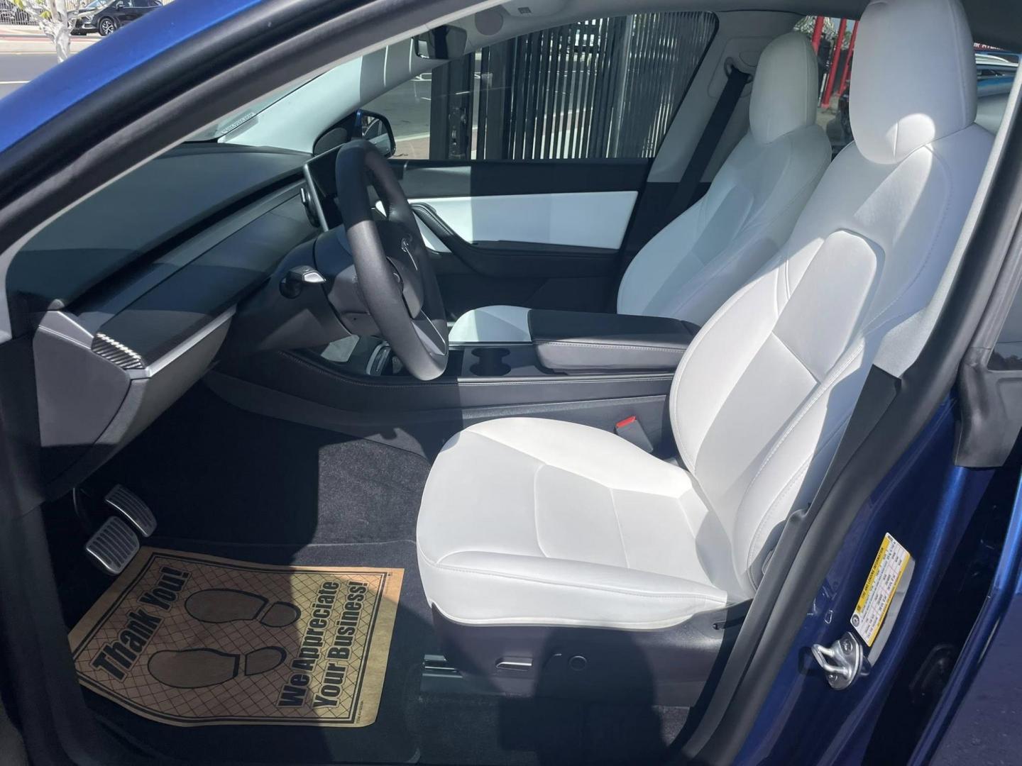 2022 Blue Tesla Model Y Long Range (7SAYGDEE7NF) with an ELECTRIC engine, 1A transmission, located at 744 E Miner Ave, Stockton, CA, 95202, (209) 944-5770, 37.956863, -121.282082 - PLUS TAXES AND FEES NO CHARGER AVAILABLE - Photo#5