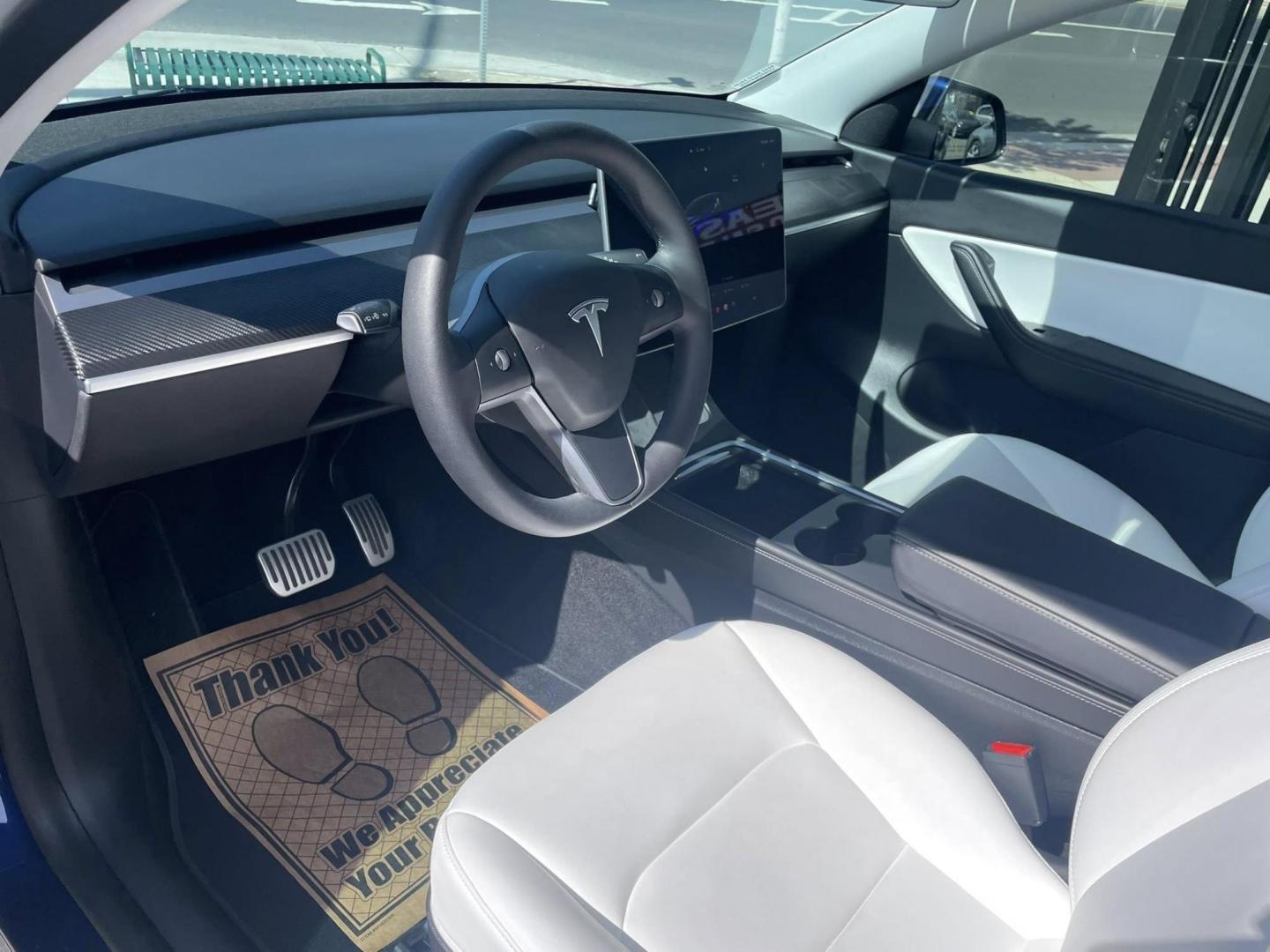 2022 Blue Tesla Model Y Long Range (7SAYGDEE7NF) with an ELECTRIC engine, 1A transmission, located at 744 E Miner Ave, Stockton, CA, 95202, (209) 944-5770, 37.956863, -121.282082 - PLUS TAXES AND FEES NO CHARGER AVAILABLE - Photo#7