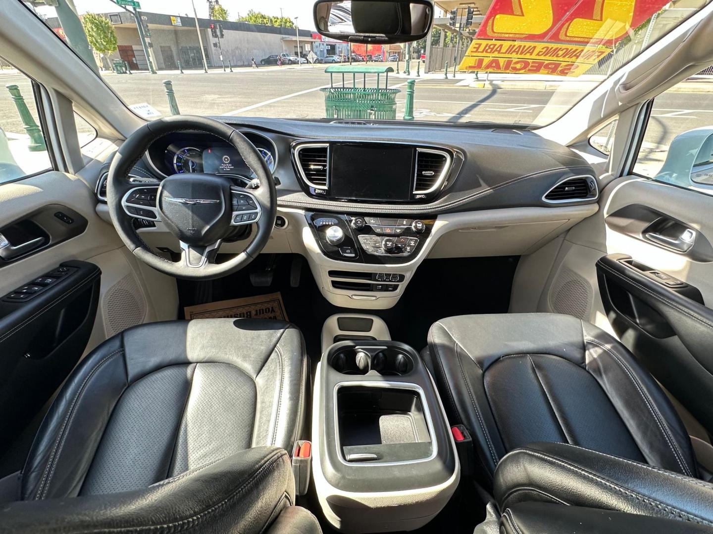 2022 Chrysler Pacifica Hybrid Touring L (2C4RC1L74NR) with an 3.6L V6 DOHC 24V HYBRID engine, CVT transmission, located at 744 E Miner Ave, Stockton, CA, 95202, (209) 944-5770, 37.956863, -121.282082 - Photo#9