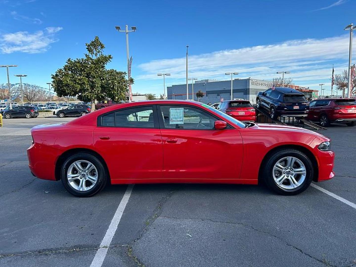 2022 RED Dodge Charger (2C3CDXBG6NH) with an V6 3.6 Liter engine, Automatic 8-Spd w/AutoStick transmission, located at 412 Auto Vista Drive, Palmdale, 93551, (661) 945-0620, 34.592636, -118.136681 - Photo#7