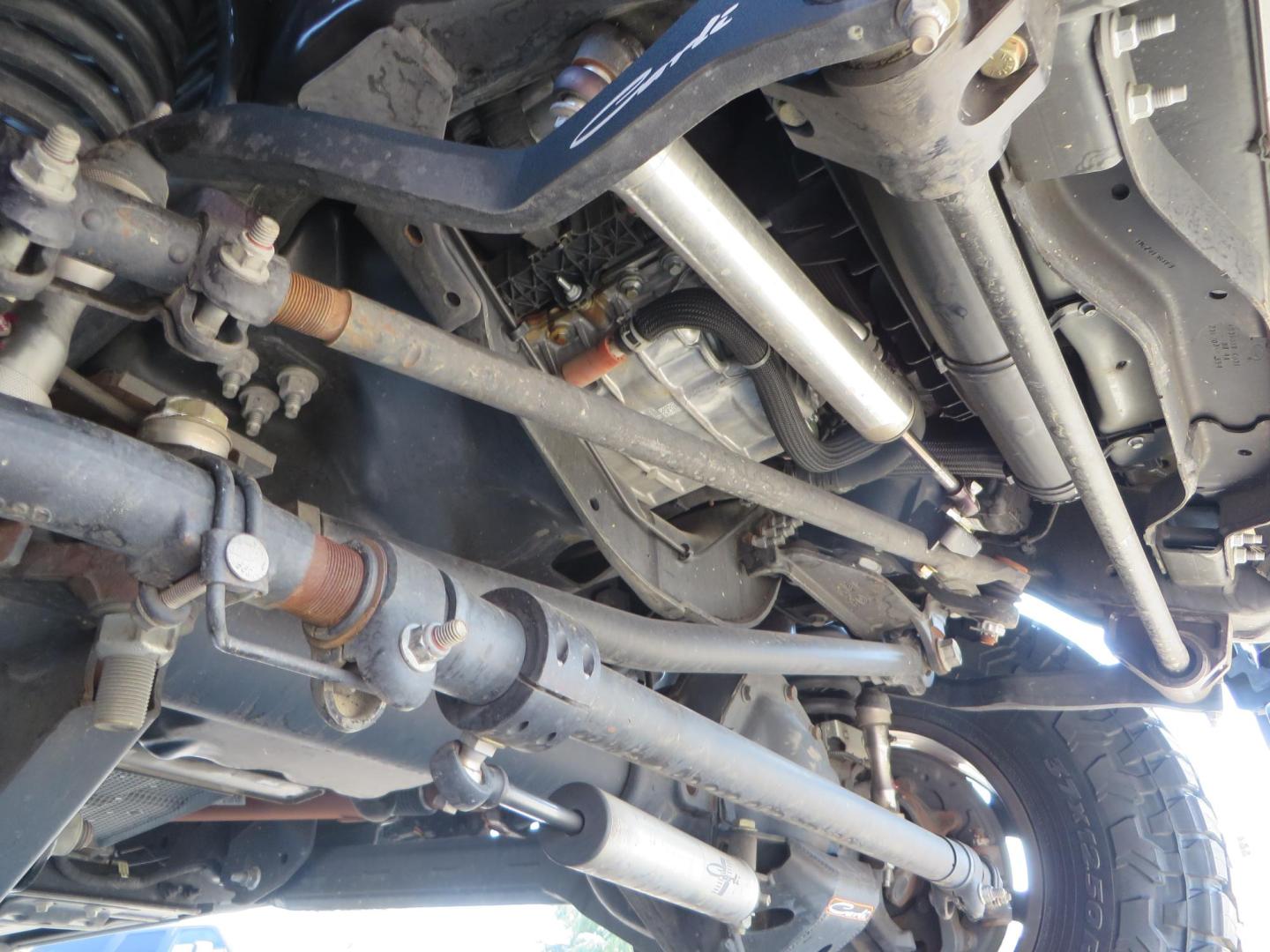 2022 SILVER /BLACK Ford F-250 SD Lariat Crew Cab 4WD (1FT8W2BT6NE) with an 6.7L V8 OHV 16V DIESEL engine, 6A transmission, located at 2630 Grass Valley Highway, Auburn, CA, 95603, (530) 508-5100, 38.937893, -121.095482 - Dont miss this F-250 sitting on a Carli Back Country suspension system, Fox remote reservoir shocks, Radius arms, Deaver rear springs, Torsion sway bar, upper and lower stabilizers, 37" Toyo RT Trail tires, 17" Innov8 G500 wheels, Baja Designs Fog light kit, Diamondback bedcover, Bed Molle panels, - Photo#14