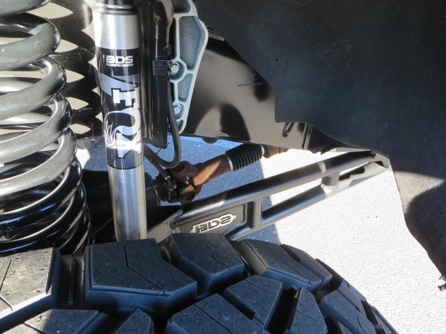 2022 BLACK /BLACK Ford F-250 SD Platinum Tremor Crew Cab Short Bed 4WD (1FT8W2BT2NE) with an 6.7L V8 OHV 16V DIESEL engine, 10 speed transmission, located at 2630 Grass Valley Highway, Auburn, CA, 95603, (530) 508-5100, 38.937893, -121.095482 - Features - BDS 4" Radius arm suspension system, Fox 2.0 shocks, Dual Fox steering stabilizers, 37" Nitto Ridge Grappler tires, 20" Fuel Rebel wheels, Airlift air bags, Airlift wireless 1 compressor, and window tint. - Photo#11