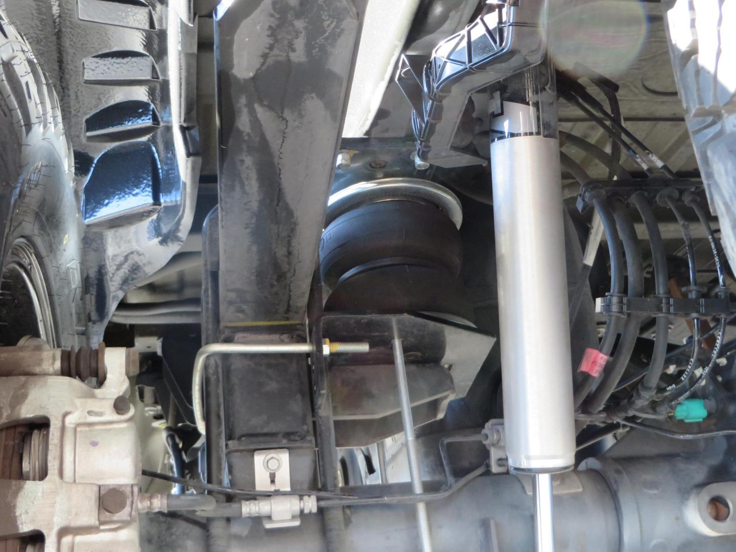 2022 BLACK /BLACK Ford F-250 SD Platinum Tremor Crew Cab Short Bed 4WD (1FT8W2BT2NE) with an 6.7L V8 OHV 16V DIESEL engine, 10 speed transmission, located at 2630 Grass Valley Highway, Auburn, CA, 95603, (530) 508-5100, 38.937893, -121.095482 - Features - BDS 4" Radius arm suspension system, Fox 2.0 shocks, Dual Fox steering stabilizers, 37" Nitto Ridge Grappler tires, 20" Fuel Rebel wheels, Airlift air bags, Airlift wireless 1 compressor, and window tint. - Photo#15