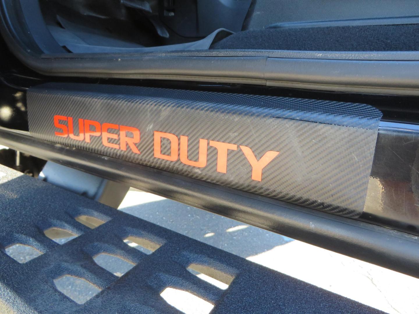 2022 BLACK /BLACK Ford F-250 SD Platinum Tremor Crew Cab Short Bed 4WD (1FT8W2BT2NE) with an 6.7L V8 OHV 16V DIESEL engine, 10 speed transmission, located at 2630 Grass Valley Highway, Auburn, CA, 95603, (530) 508-5100, 38.937893, -121.095482 - Features - BDS 4" Radius arm suspension system, Fox 2.0 shocks, Dual Fox steering stabilizers, 37" Nitto Ridge Grappler tires, 20" Fuel Rebel wheels, Airlift air bags, Airlift wireless 1 compressor, and window tint. - Photo#25