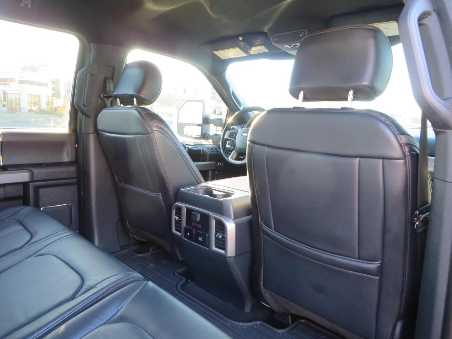 2022 BLACK /BLACK Ford F-250 SD Platinum Tremor Crew Cab Short Bed 4WD (1FT8W2BT2NE) with an 6.7L V8 OHV 16V DIESEL engine, 10 speed transmission, located at 2630 Grass Valley Highway, Auburn, CA, 95603, (530) 508-5100, 38.937893, -121.095482 - Features - BDS 4" Radius arm suspension system, Fox 2.0 shocks, Dual Fox steering stabilizers, 37" Nitto Ridge Grappler tires, 20" Fuel Rebel wheels, Airlift air bags, Airlift wireless 1 compressor, and window tint. - Photo#75