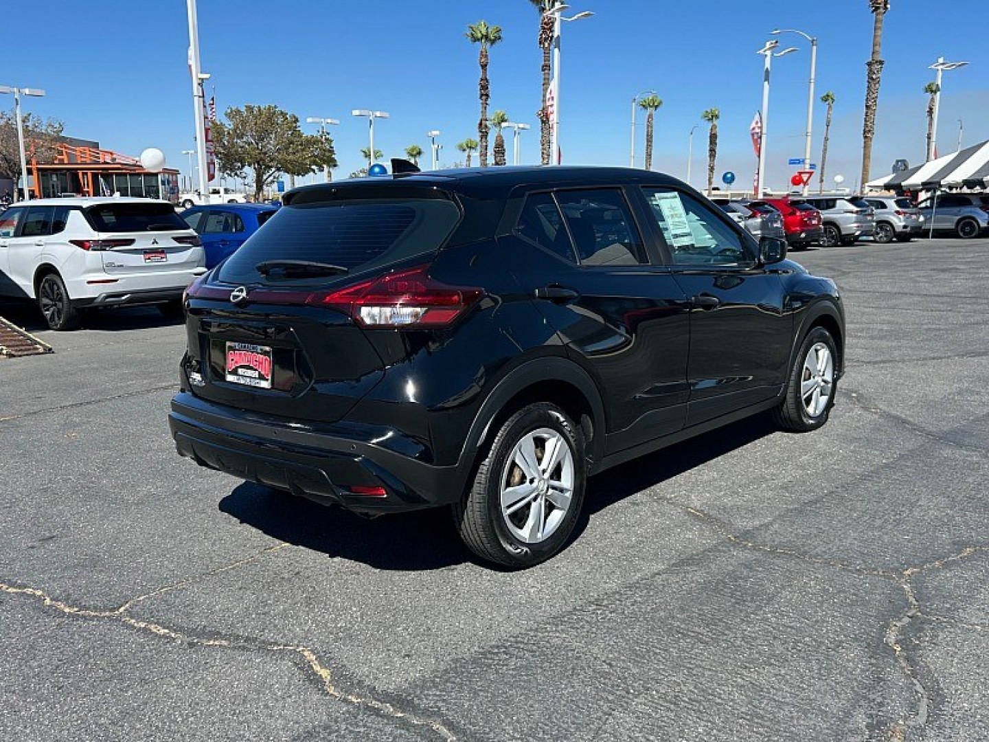2022 Black Nissan Kicks (3N1CP5BV9NL) with an 4-Cyl 1.6 Liter engine, Automatic CVT w/Xtronic transmission, located at 412 Auto Vista Drive, Palmdale, 93551, (661) 945-0620, 34.592636, -118.136681- Photo#2