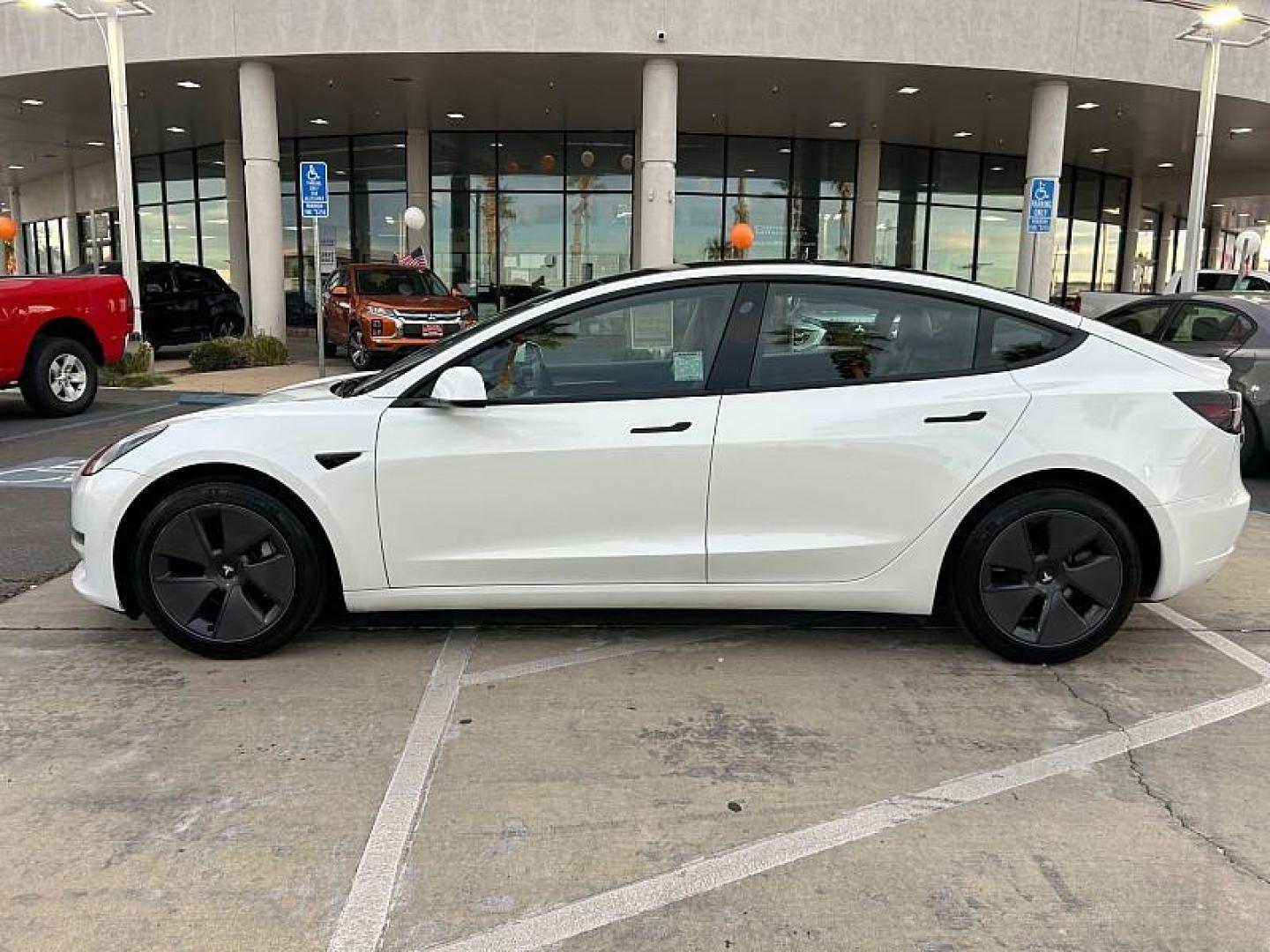 2022 WHITE Tesla Model 3 (5YJ3E1EA3NF) with an AC Electric Motor engine, Single-Speed Fixed Gear transmission, located at 412 Auto Vista Drive, Palmdale, 93551, (661) 945-0620, 34.592636, -118.136681 - Photo#5