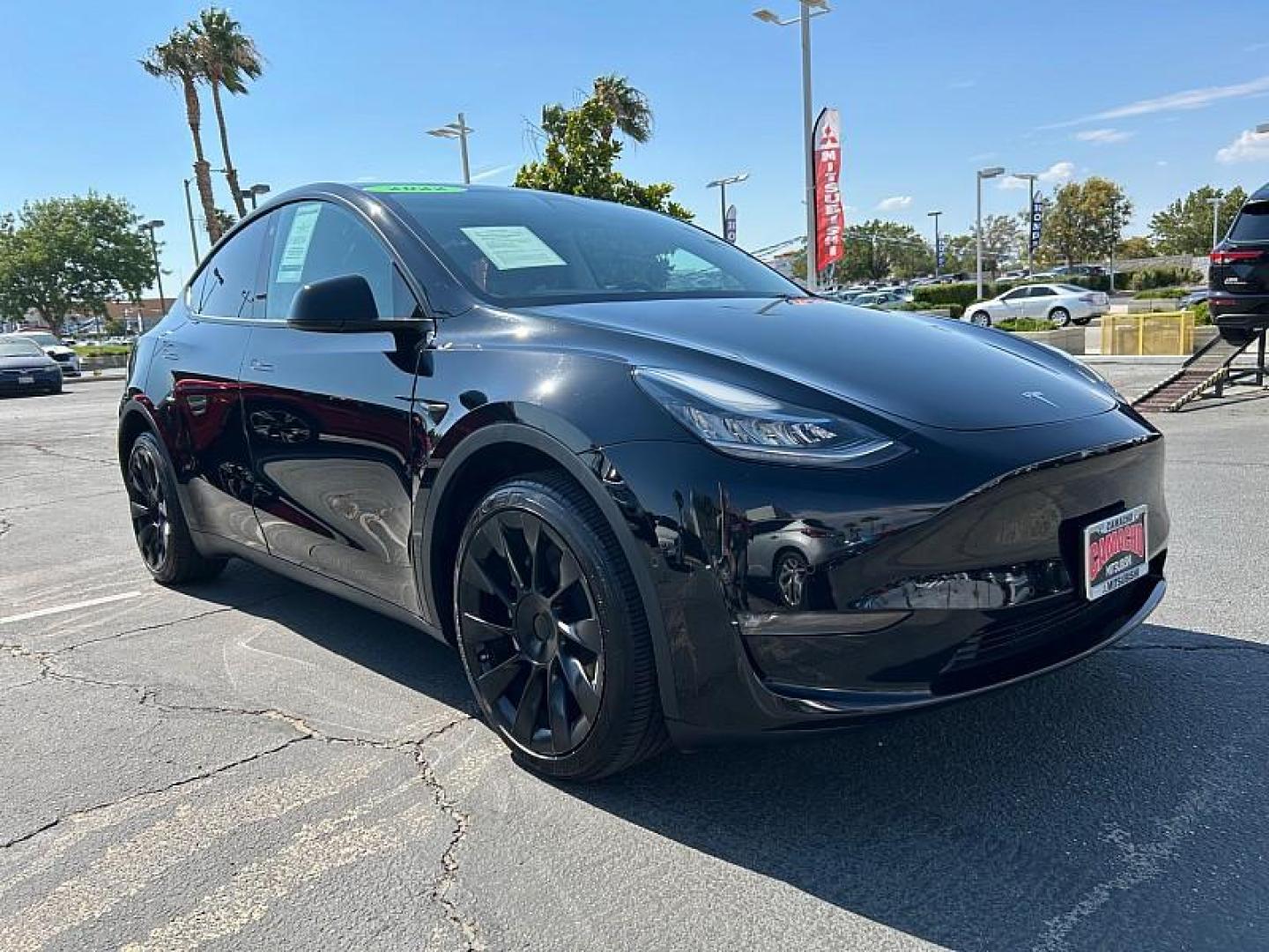2022 BLACK Tesla Model Y (7SAYGDEE3NF) with an Dual AC Electric Motors engine, Single-Speed Fixed Gear transmission, located at 412 Auto Vista Drive, Palmdale, 93551, (661) 945-0620, 34.592636, -118.136681 - Photo#0