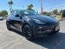 2022 BLACK Tesla Model Y (7SAYGDEE3NF) with an Dual AC Electric Motors engine, Single-Speed Fixed Gear transmission, located at 412 Auto Vista Drive, Palmdale, 93551, (661) 945-0620, 34.592636, -118.136681 - Photo#0