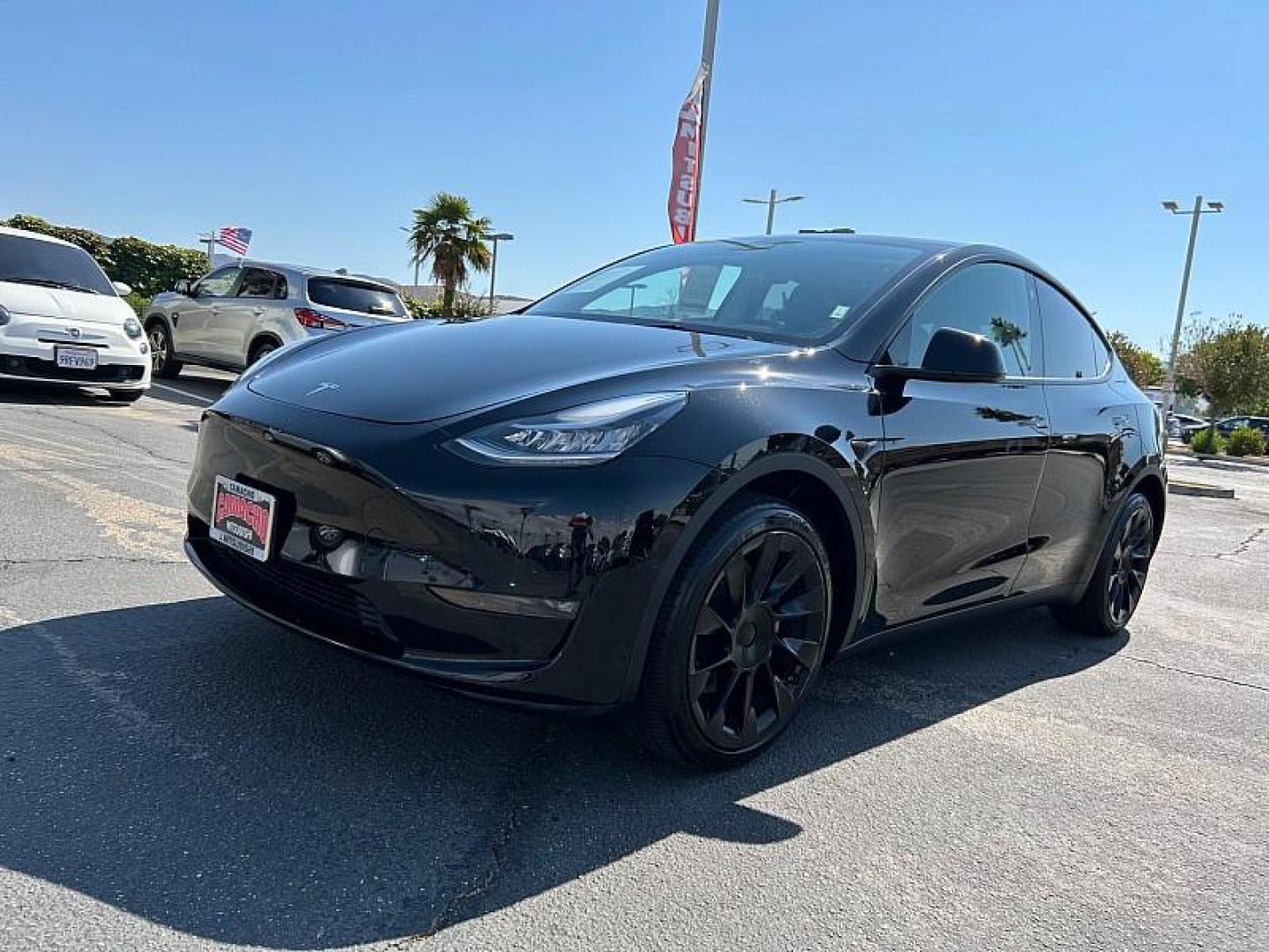 2022 BLACK Tesla Model Y (7SAYGDEE3NF) with an Dual AC Electric Motors engine, Single-Speed Fixed Gear transmission, located at 412 Auto Vista Drive, Palmdale, 93551, (661) 945-0620, 34.592636, -118.136681 - Photo#2