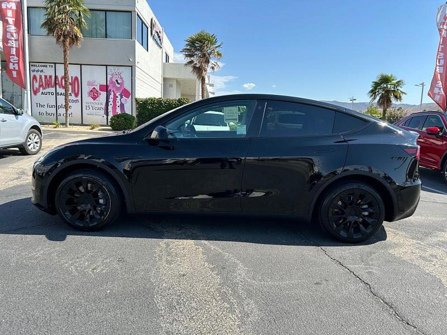 2022 BLACK Tesla Model Y (7SAYGDEE3NF) with an Dual AC Electric Motors engine, Single-Speed Fixed Gear transmission, located at 412 Auto Vista Drive, Palmdale, 93551, (661) 945-0620, 34.592636, -118.136681 - Photo#3