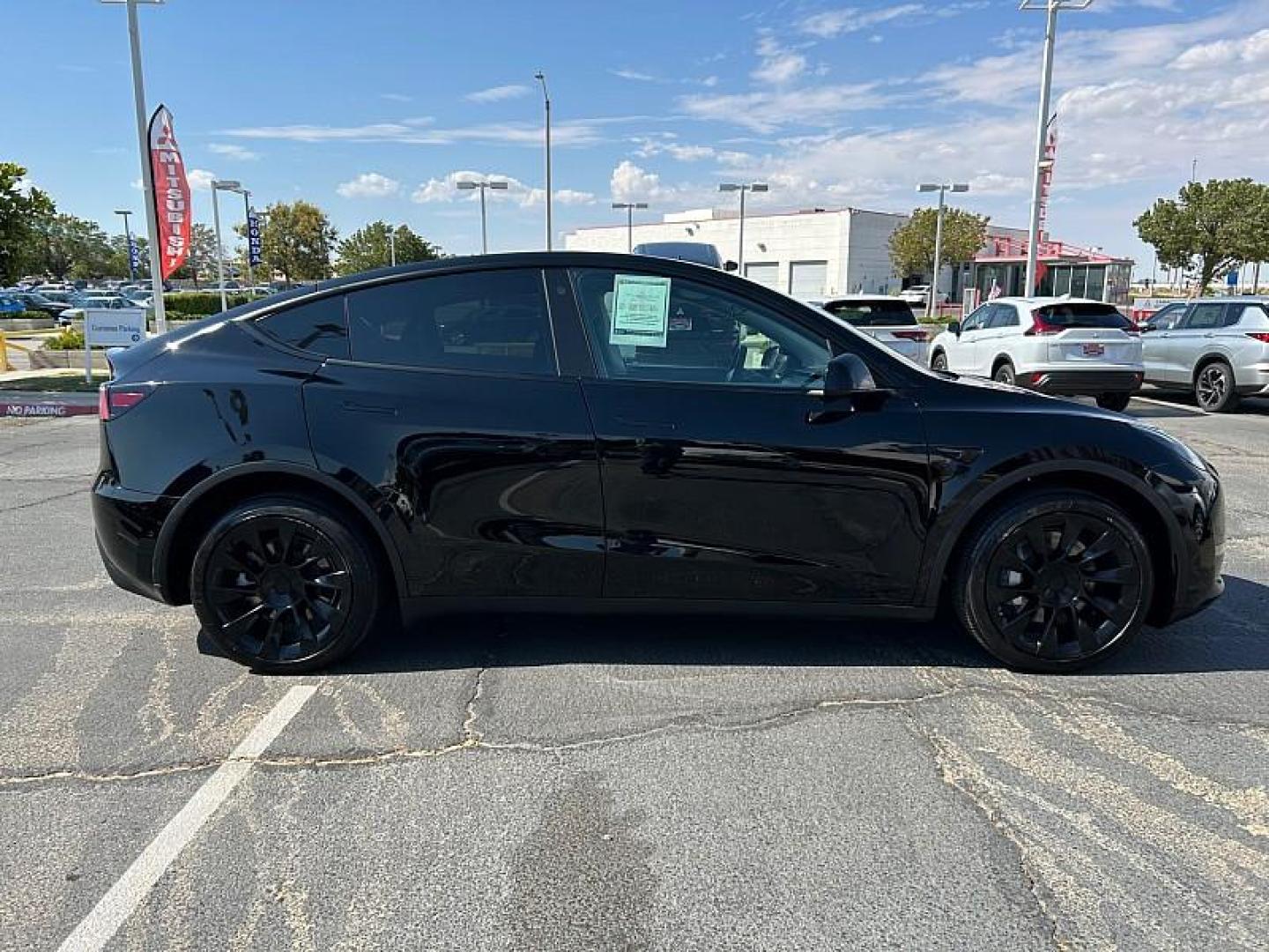 2022 BLACK Tesla Model Y (7SAYGDEE3NF) with an Dual AC Electric Motors engine, Single-Speed Fixed Gear transmission, located at 412 Auto Vista Drive, Palmdale, 93551, (661) 945-0620, 34.592636, -118.136681 - Photo#5