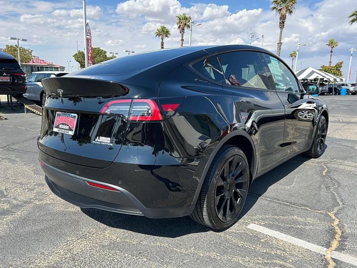 2022 BLACK Tesla Model Y (7SAYGDEE3NF) with an Dual AC Electric Motors engine, Single-Speed Fixed Gear transmission, located at 412 Auto Vista Drive, Palmdale, 93551, (661) 945-0620, 34.592636, -118.136681 - Photo#6