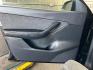 2022 BLACK Tesla Model Y (7SAYGDEE3NF) with an Dual AC Electric Motors engine, Single-Speed Fixed Gear transmission, located at 412 Auto Vista Drive, Palmdale, 93551, (661) 945-0620, 34.592636, -118.136681 - Photo#16