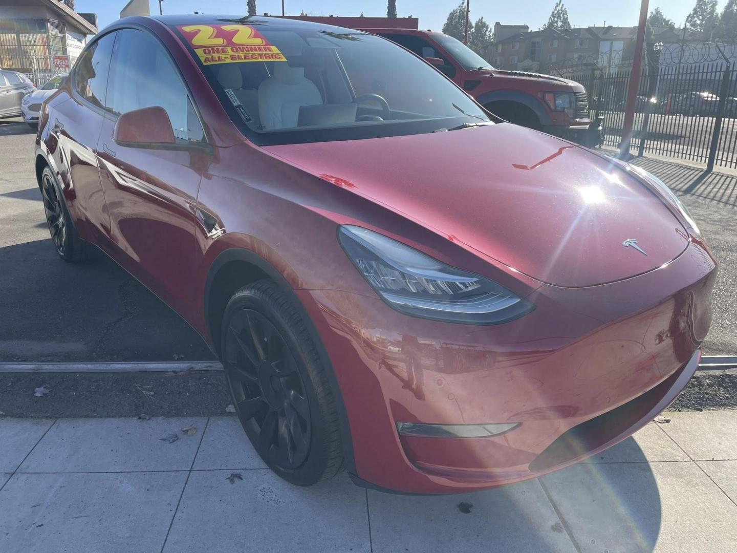 2022 RED Tesla Model Y Long Range (7SAYGDEE1NF) with an ELECTRIC engine, 1A transmission, located at 744 E Miner Ave, Stockton, CA, 95202, (209) 944-5770, 37.956863, -121.282082 - PLUS TAXES AND FEES - Photo#0