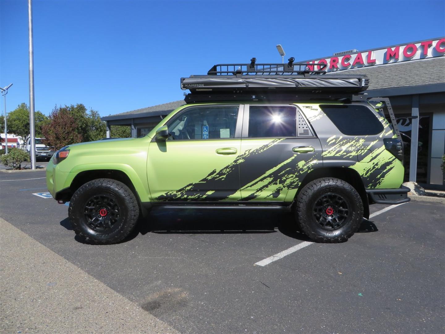 2022 Green /Black Toyota 4Runner TRD PRO 4WD (JTELU5JR6N6) with an 4.0L V6 DOHC 24V engine, 5A transmission, located at 2630 Grass Valley Highway, Auburn, CA, 95603, (530) 508-5100, 38.937893, -121.095482 - Features- A Magnuson Supercharger, Westcott Designs level kit and Roof Ladder, BFG KO3 tires, IronMan Front and rear bumpers, Winch, Led lighting, Rock Sliders, Alpha Rex tail lights, IKamper roof rack, Mamba Roof mounted tent, Yakima roof basket, Kammok Awning, Smoked bug deflector, Pedal Commander - Photo#1