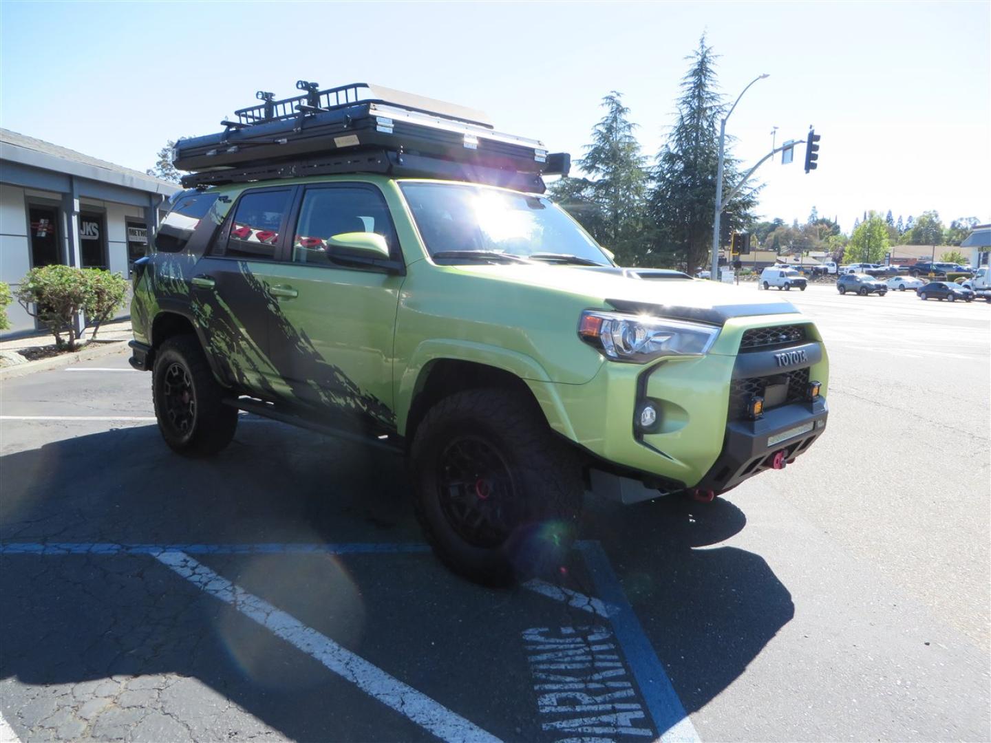 2022 Green /Black Toyota 4Runner TRD PRO 4WD (JTELU5JR6N6) with an 4.0L V6 DOHC 24V engine, 5A transmission, located at 2630 Grass Valley Highway, Auburn, CA, 95603, (530) 508-5100, 38.937893, -121.095482 - Features- A Magnuson Supercharger, Westcott Designs level kit and Roof Ladder, BFG KO3 tires, IronMan Front and rear bumpers, Winch, Led lighting, Rock Sliders, Alpha Rex tail lights, IKamper roof rack, Mamba Roof mounted tent, Yakima roof basket, Kammok Awning, Smoked bug deflector, Pedal Commander - Photo#6