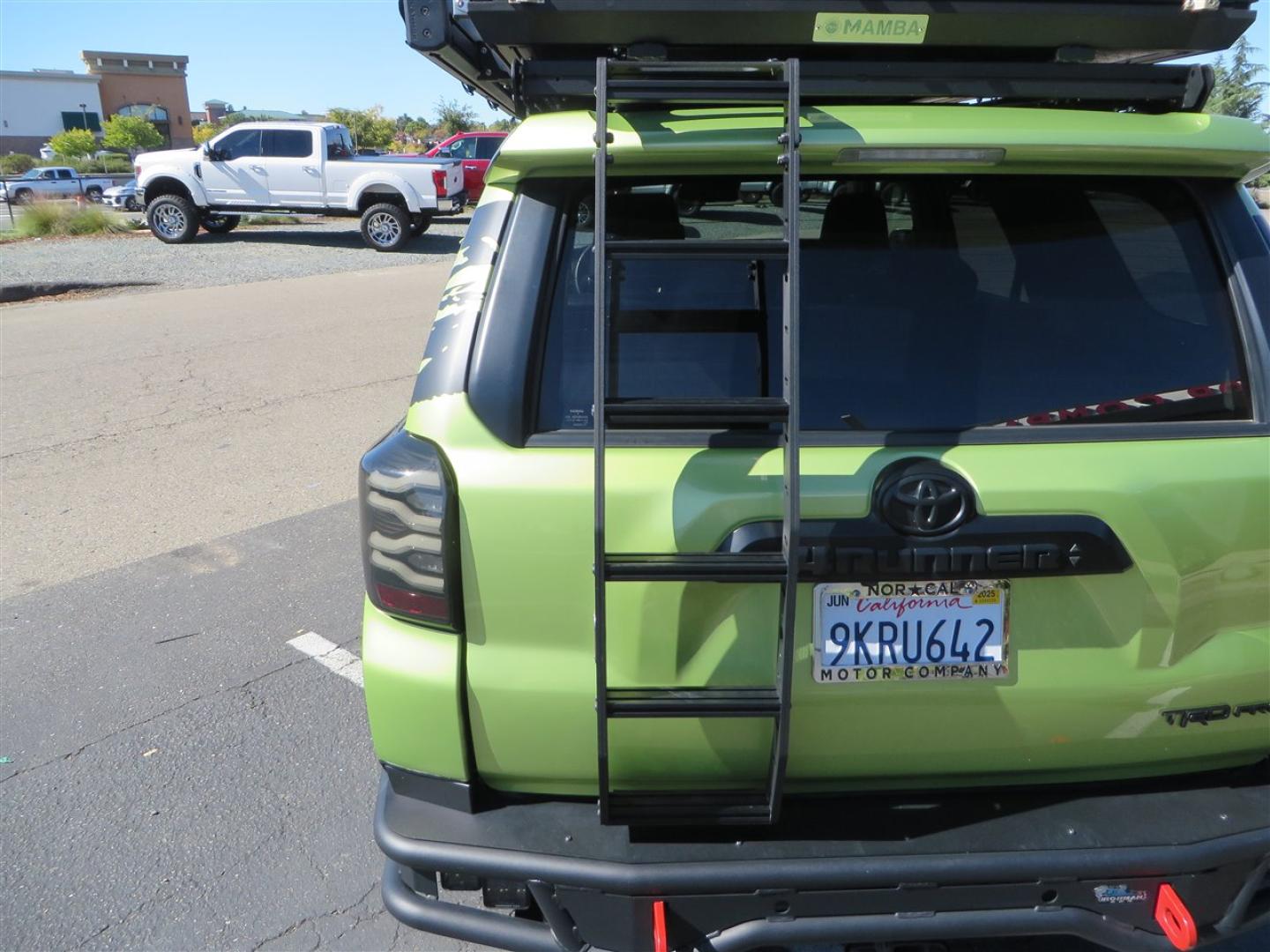 2022 Green /Black Toyota 4Runner TRD PRO 4WD (JTELU5JR6N6) with an 4.0L V6 DOHC 24V engine, 5A transmission, located at 2630 Grass Valley Highway, Auburn, CA, 95603, (530) 508-5100, 38.937893, -121.095482 - Features- A Magnuson Supercharger, Westcott Designs level kit and Roof Ladder, BFG KO3 tires, IronMan Front and rear bumpers, Winch, Led lighting, Rock Sliders, Alpha Rex tail lights, IKamper roof rack, Mamba Roof mounted tent, Yakima roof basket, Kammok Awning, Smoked bug deflector, Pedal Commander - Photo#20