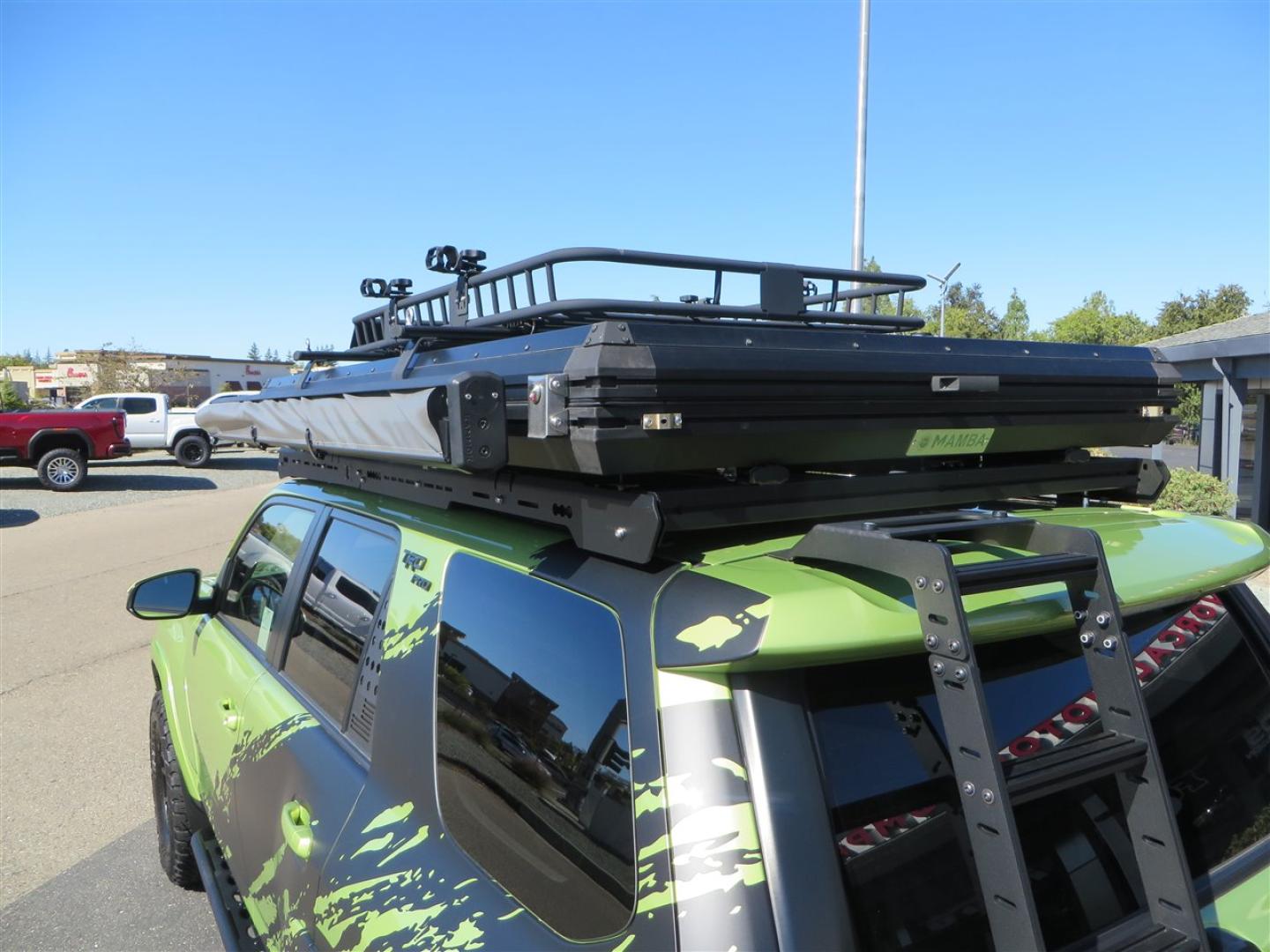 2022 Green /Black Toyota 4Runner TRD PRO 4WD (JTELU5JR6N6) with an 4.0L V6 DOHC 24V engine, 5A transmission, located at 2630 Grass Valley Highway, Auburn, CA, 95603, (530) 508-5100, 38.937893, -121.095482 - Features- A Magnuson Supercharger, Westcott Designs level kit and Roof Ladder, BFG KO3 tires, IronMan Front and rear bumpers, Winch, Led lighting, Rock Sliders, Alpha Rex tail lights, IKamper roof rack, Mamba Roof mounted tent, Yakima roof basket, Kammok Awning, Smoked bug deflector, Pedal Commander - Photo#23