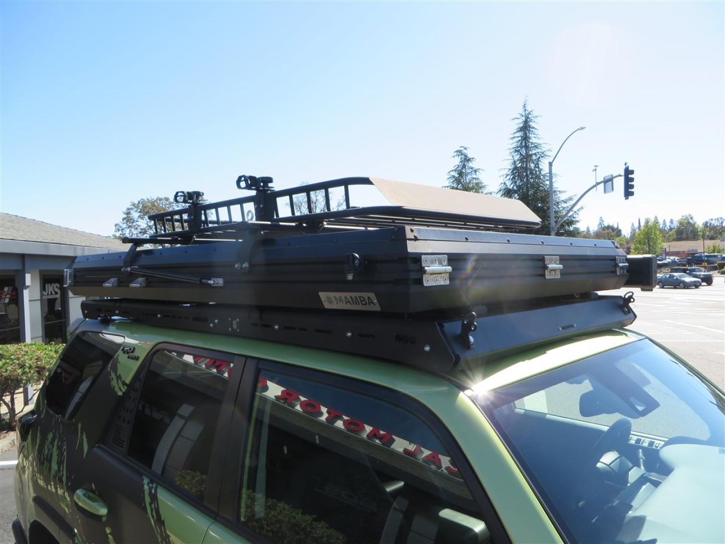 2022 Green /Black Toyota 4Runner TRD PRO 4WD (JTELU5JR6N6) with an 4.0L V6 DOHC 24V engine, 5A transmission, located at 2630 Grass Valley Highway, Auburn, CA, 95603, (530) 508-5100, 38.937893, -121.095482 - Features- A Magnuson Supercharger, Westcott Designs level kit and Roof Ladder, BFG KO3 tires, IronMan Front and rear bumpers, Winch, Led lighting, Rock Sliders, Alpha Rex tail lights, IKamper roof rack, Mamba Roof mounted tent, Yakima roof basket, Kammok Awning, Smoked bug deflector, Pedal Commander - Photo#25