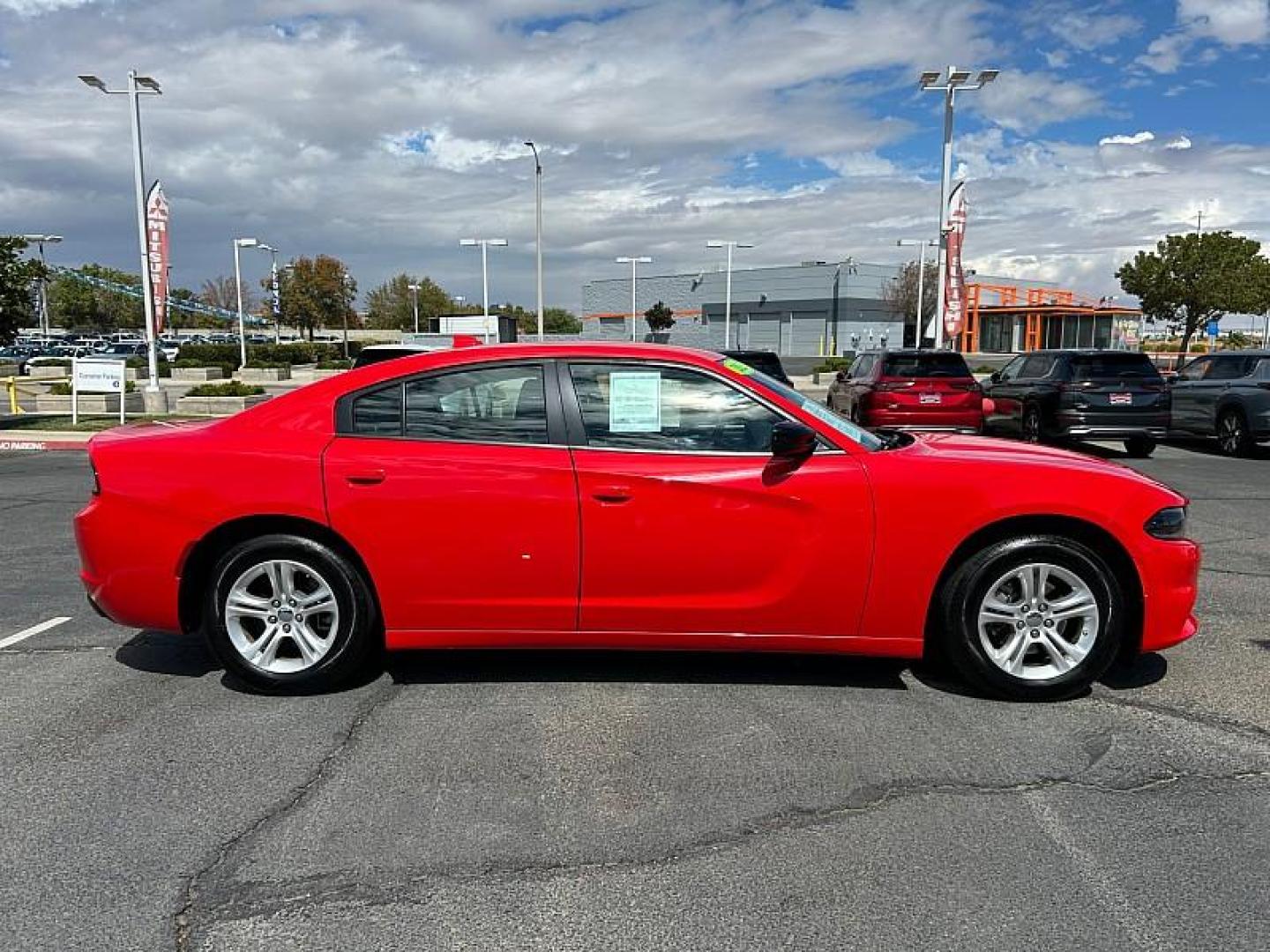 2023 RED Dodge Charger (2C3CDXBG5PH) with an V6 3.6 Liter engine, Automatic 8-Spd w/AutoStick transmission, located at 412 Auto Vista Drive, Palmdale, 93551, (661) 945-0620, 34.592636, -118.136681 - Photo#4