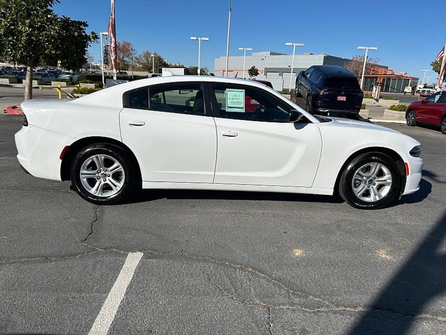 2023 WHITE Dodge Charger (2C3CDXBG9PH) with an V6 3.6 Liter engine, Automatic 8-Spd w/AutoStick transmission, located at 412 Auto Vista Drive, Palmdale, 93551, (661) 945-0620, 34.592636, -118.136681 - Photo#11