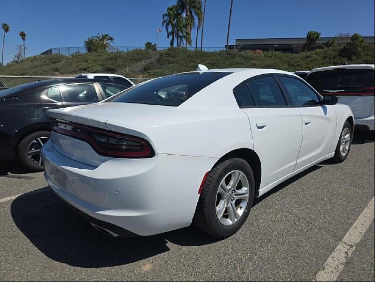 2023 WHITE Dodge Charger (2C3CDXBG1PH) with an V6 3.6 Liter engine, Automatic 8-Spd w/AutoStick transmission, located at 412 Auto Vista Drive, Palmdale, 93551, (661) 945-0620, 34.592636, -118.136681 - Photo#1