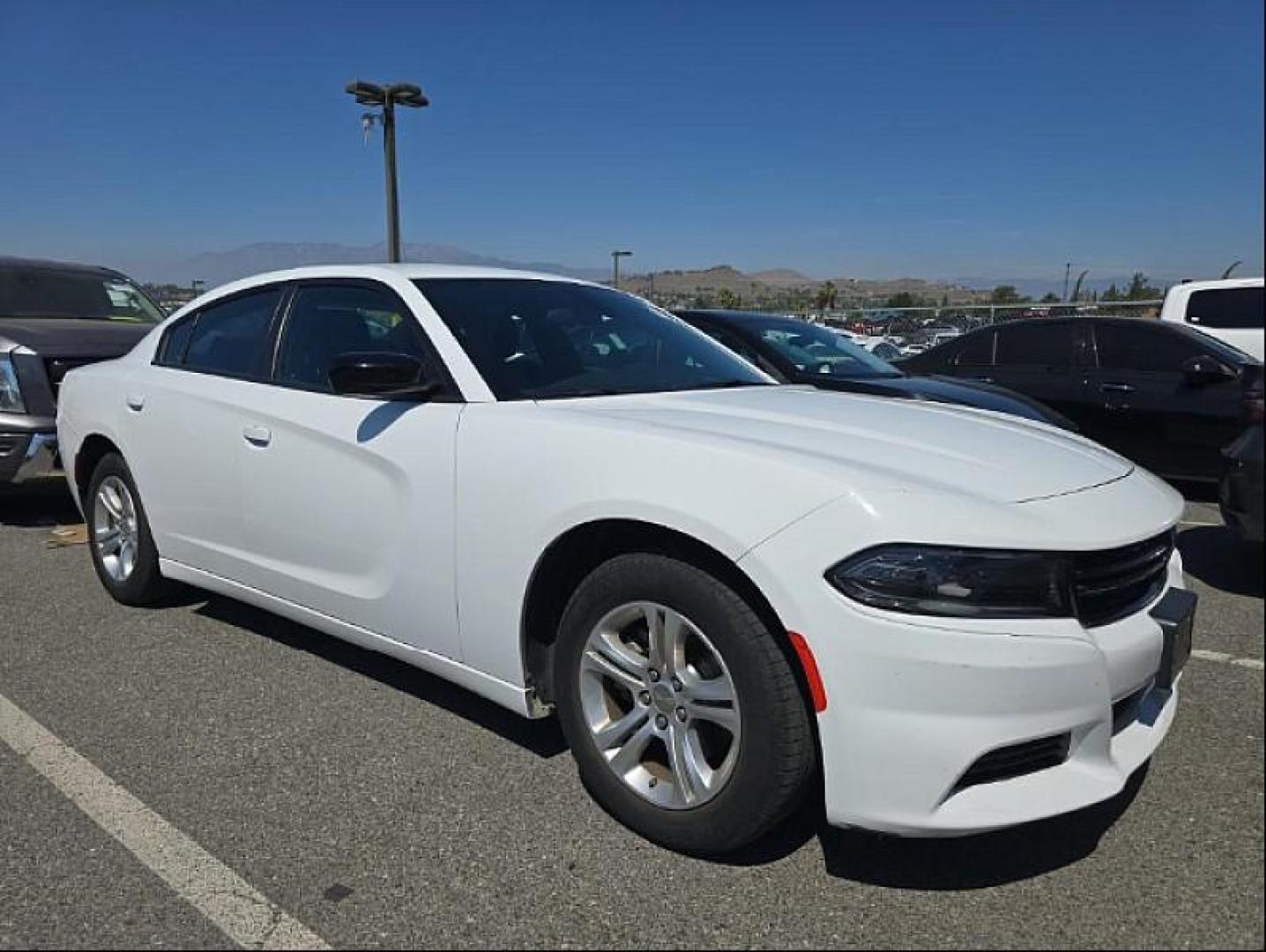 2023 WHITE Dodge Charger (2C3CDXBG1PH) with an V6 3.6 Liter engine, Automatic 8-Spd w/AutoStick transmission, located at 412 Auto Vista Drive, Palmdale, 93551, (661) 945-0620, 34.592636, -118.136681 - Photo#2