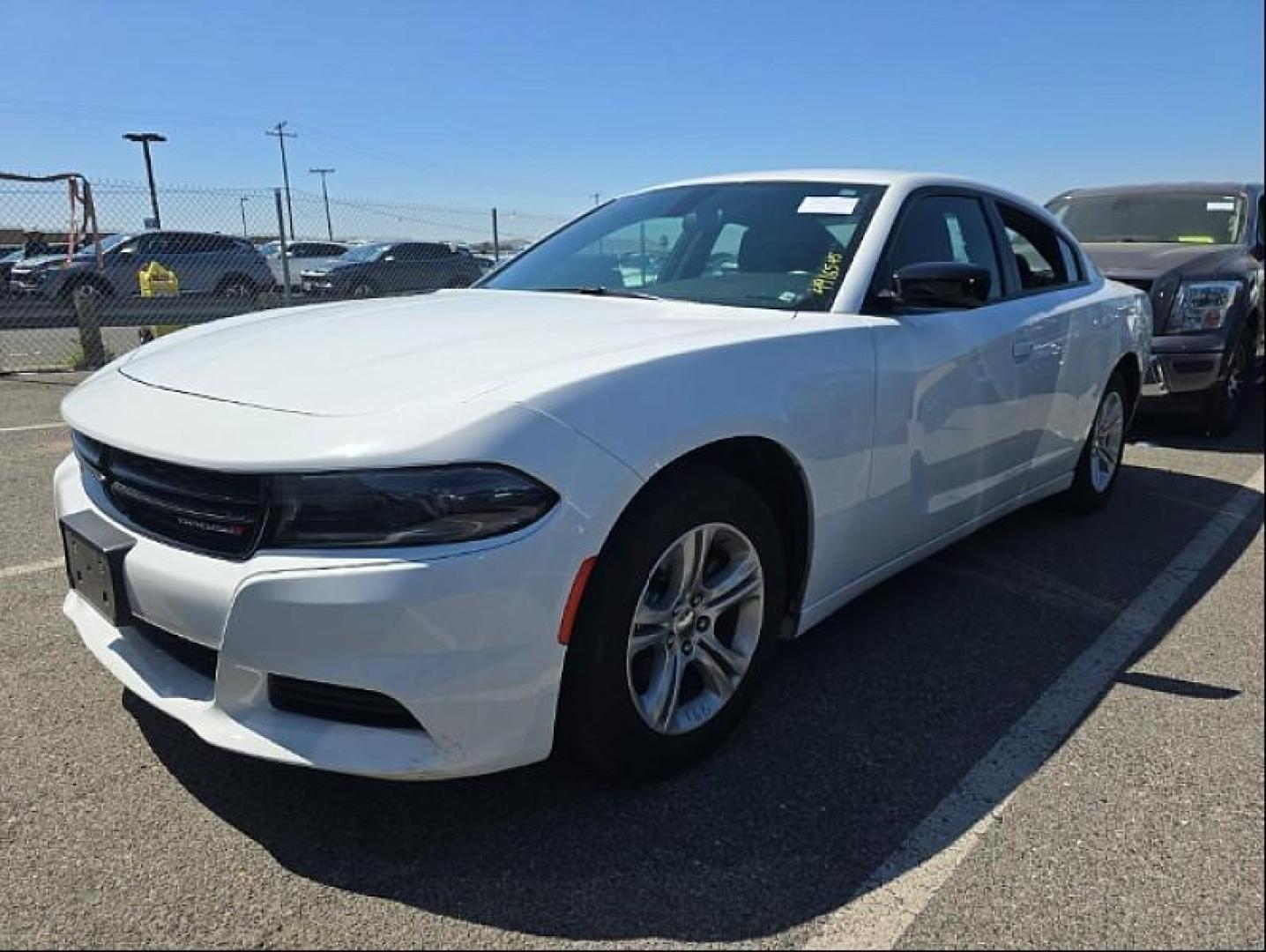 2023 WHITE Dodge Charger (2C3CDXBG1PH) with an V6 3.6 Liter engine, Automatic 8-Spd w/AutoStick transmission, located at 412 Auto Vista Drive, Palmdale, 93551, (661) 945-0620, 34.592636, -118.136681 - Photo#3