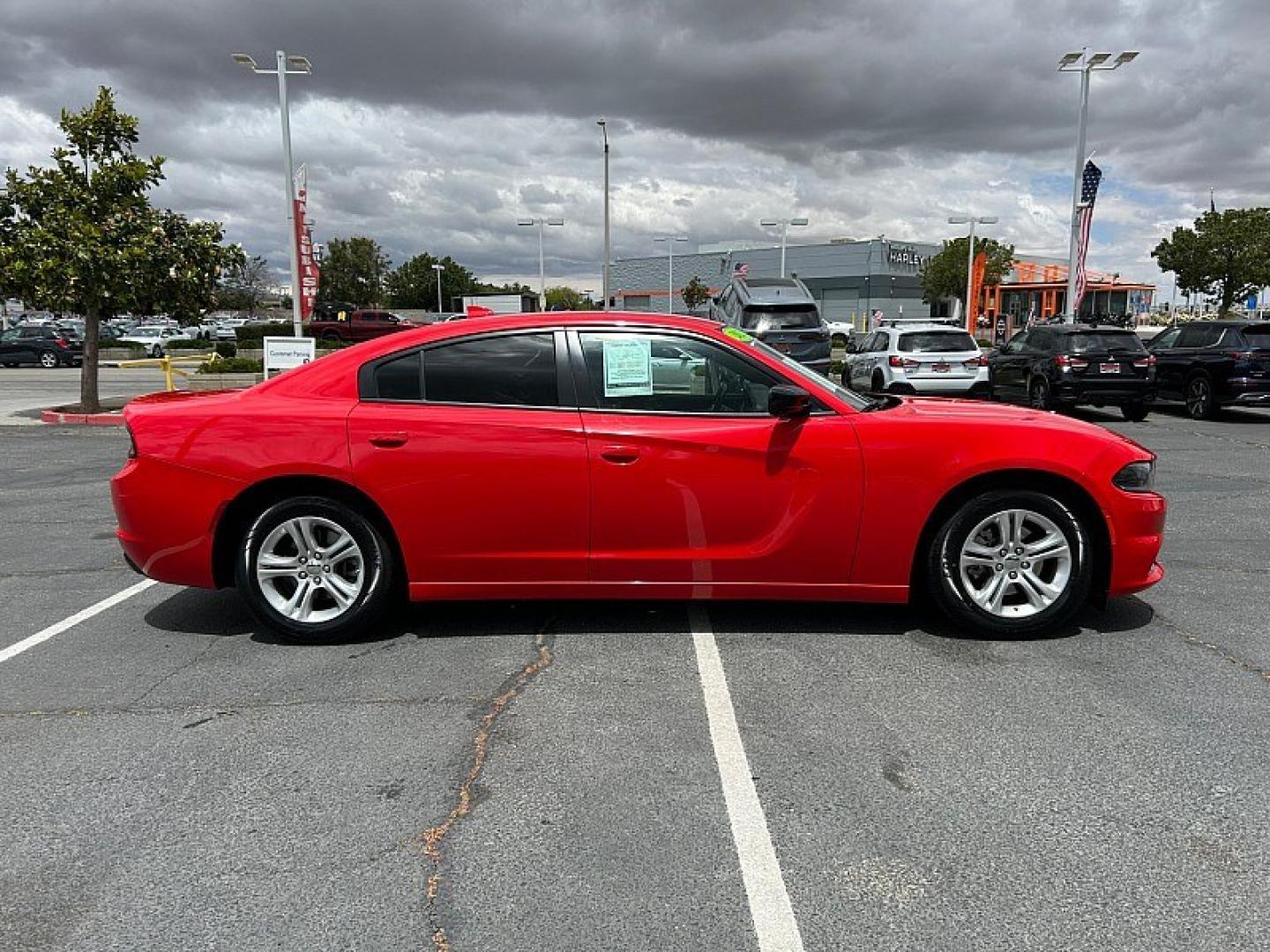 2023 RED Dodge Charger (2C3CDXBG6PH) with an V6 3.6 Liter engine, Automatic 8-Spd w/AutoStick transmission, located at 412 Auto Vista Drive, Palmdale, 93551, (661) 945-0620, 34.592636, -118.136681 - Photo#7