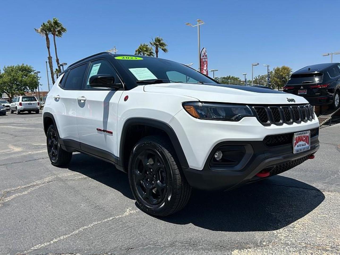 2023 WHITE Jeep Compass (3C4NJDDN2PT) with an 4-Cyl Turbo 2.0 Liter engine, Automatic 8-Spd transmission, located at 412 Auto Vista Drive, Palmdale, 93551, (661) 945-0620, 34.592636, -118.136681 - Photo#0